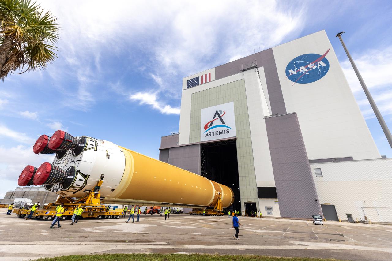 After completing its journey from NASA’s Michoud Assembly Facility in New Orleans aboard the Pegasus barge, teams with Exploration Ground Systems (EGS) transport the agency’s powerful SLS (Space Launch System) core stage to NASA’s Kennedy Space Center’s Vehicle Assembly Building in Florida on Wednesday, July 24, 2024. Once inside, SLS will be prepared for integration atop the mobile launcher ahead of the Artemis II launch.