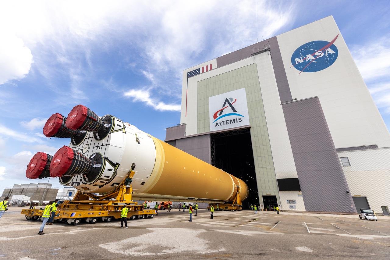 After completing its journey from NASA’s Michoud Assembly Facility in New Orleans aboard the Pegasus barge, teams with Exploration Ground Systems (EGS) transport the agency’s powerful SLS (Space Launch System) core stage to NASA’s Kennedy Space Center’s Vehicle Assembly Building in Florida on Wednesday, July 24, 2024. Once inside, SLS will be prepared for integration atop the mobile launcher ahead of the Artemis II launch.