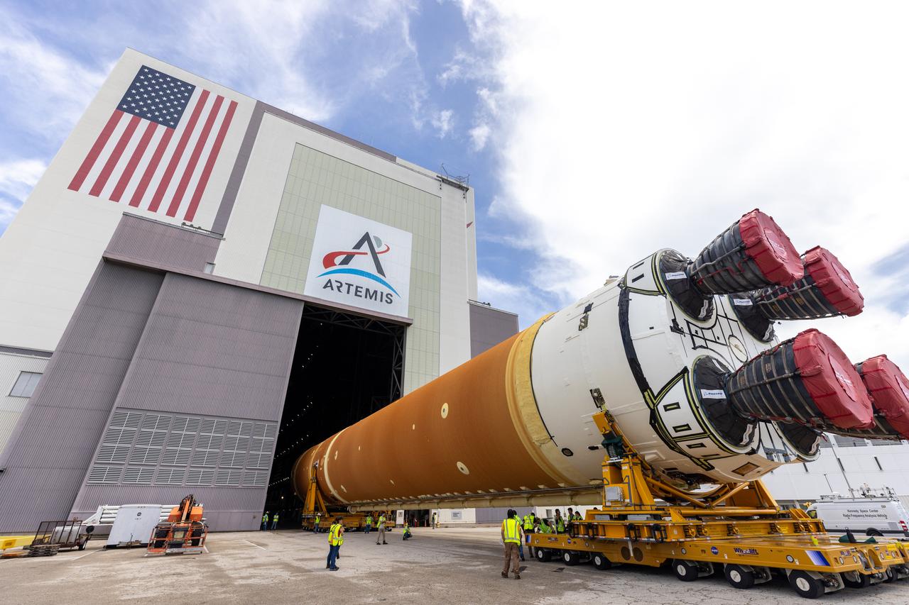 After completing its journey from NASA’s Michoud Assembly Facility in New Orleans aboard the Pegasus barge, teams with Exploration Ground Systems (EGS) transport the agency’s powerful SLS (Space Launch System) core stage to NASA’s Kennedy Space Center’s Vehicle Assembly Building in Florida on Wednesday, July 24, 2024. Once inside, SLS will be prepared for integration atop the mobile launcher ahead of the Artemis II launch.