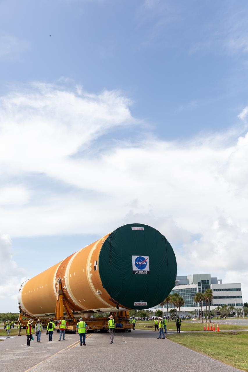 After completing its journey from NASA’s Michoud Assembly Facility in New Orleans aboard the Pegasus barge, teams with Exploration Ground Systems (EGS) transport the agency’s powerful SLS (Space Launch System) core stage to NASA’s Kennedy Space Center’s Vehicle Assembly Building in Florida on Wednesday, July 24, 2024. Once inside, SLS will be prepared for integration atop the mobile launcher ahead of the Artemis II launch.