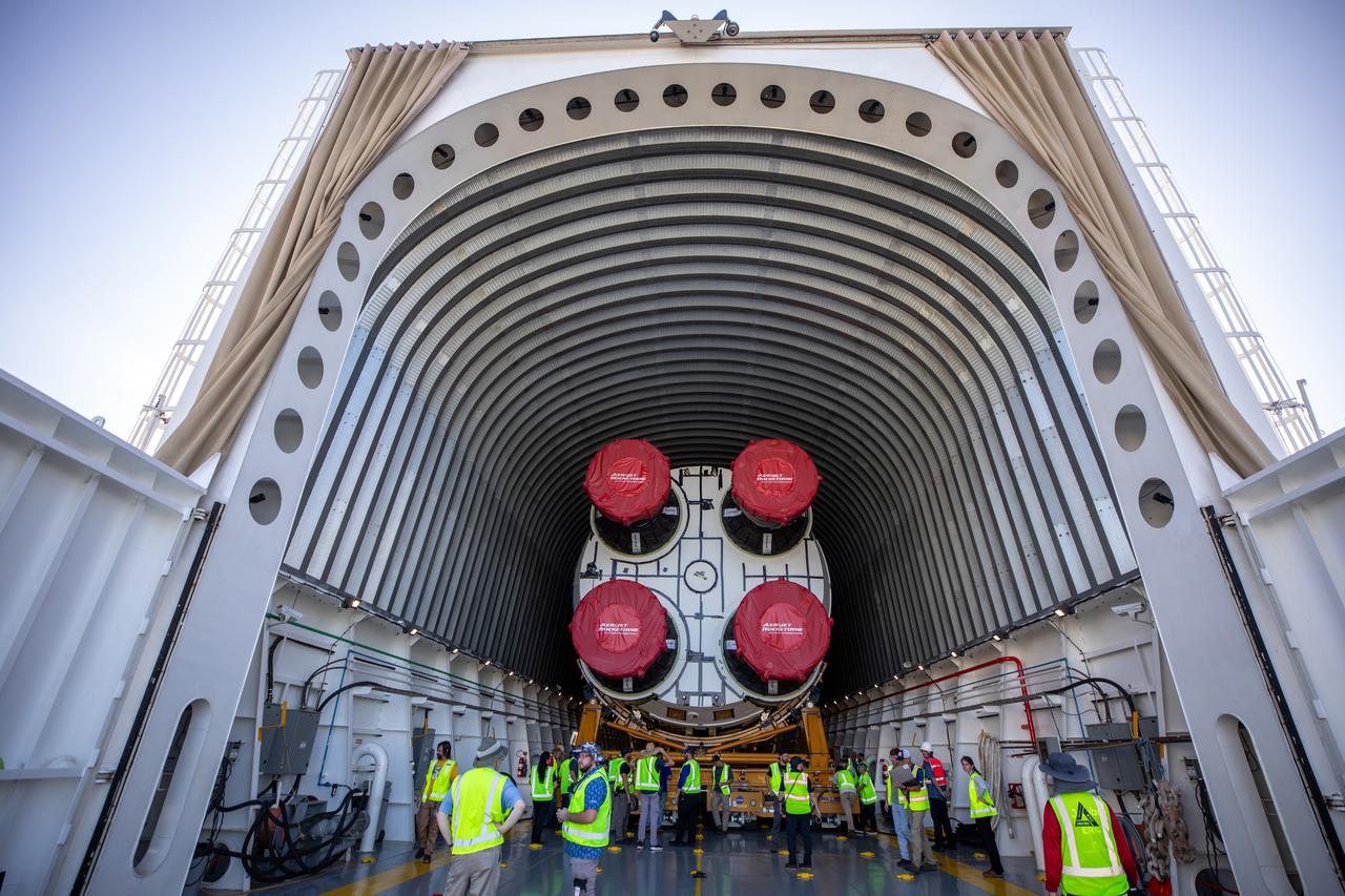 NASA’s massive 212-foot long SLS (Space Launch System) core stage is offloaded from the agency’s Pegasus Barge on Wednesday, July 24 2024, after arriving at NASA’s Kennedy Space Center in Florida. Teams with Exploration Ground Systems (EGS) will transfer the rocket stage to the spaceport’s Vehicle Assembly Building to prepare it for integration atop the mobile launcher ahead of the Artemis II launch.