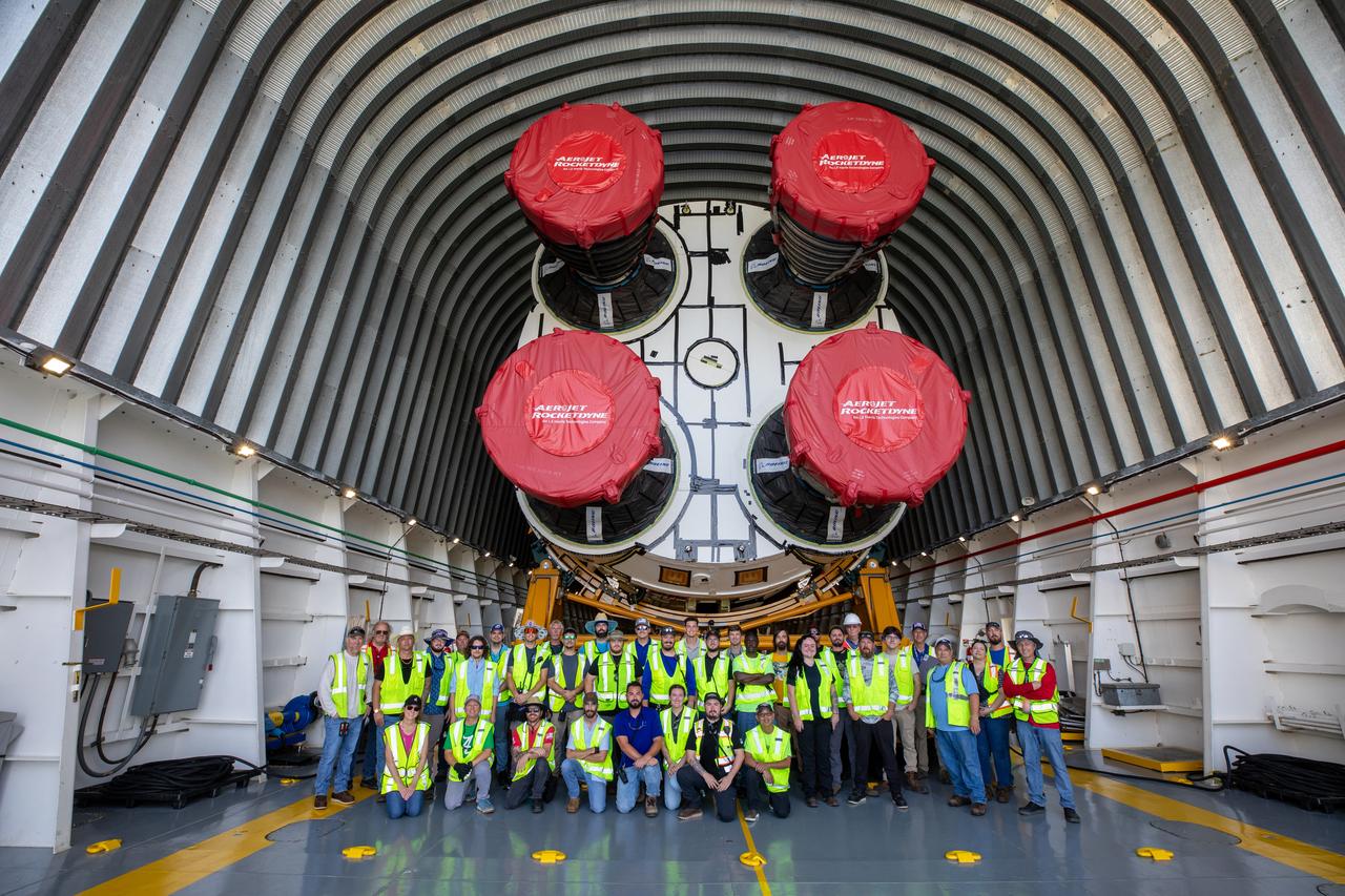NASA’s massive 212-foot long SLS (Space Launch System) core stage is offloaded from the agency’s Pegasus Barge on Wednesday, July 24 2024, after arriving at NASA’s Kennedy Space Center in Florida. Teams with Exploration Ground Systems (EGS) will transfer the rocket stage to the spaceport’s Vehicle Assembly Building to prepare it for integration atop the mobile launcher ahead of the Artemis II launch.