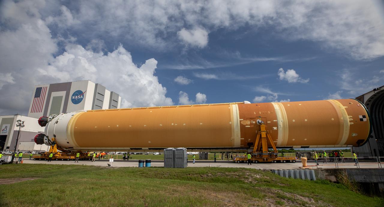 After completing its journey from NASA’s Michoud Assembly Facility in New Orleans aboard the Pegasus barge, teams with Exploration Ground Systems (EGS) transport the agency’s powerful SLS (Space Launch System) core stage to NASA’s Kennedy Space Center’s Vehicle Assembly Building in Florida on Wednesday, July 24, 2024. Once inside, SLS will be prepared for integration atop the mobile launcher ahead of the Artemis II launch. 