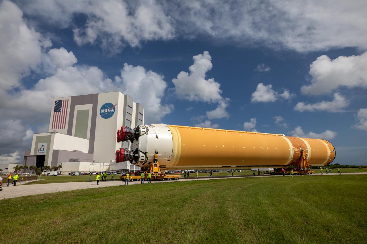 After completing its journey from NASA’s Michoud Assembly Facility in New Orleans aboard the Pegasus barge, teams with Exploration Ground Systems (EGS) transport the agency’s powerful SLS (Space Launch System) core stage to NASA’s Kennedy Space Center’s Vehicle Assembly Building in Florida on Wednesday, July 24, 2024. Once inside, SLS will be prepared for integration atop the mobile launcher ahead of the Artemis II launch. 
