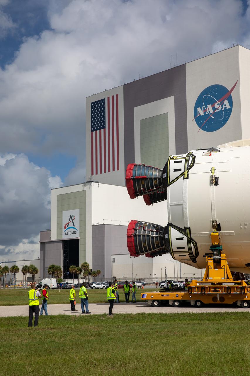 After completing its journey from NASA’s Michoud Assembly Facility in New Orleans aboard the Pegasus barge, teams with Exploration Ground Systems (EGS) transport the agency’s powerful SLS (Space Launch System) core stage to Kennedy Space Center’s Vehicle Assembly Building in Florida on Wednesday, July 24, 2024. Once inside, SLS will be prepared for integration atop the mobile launcher ahead of the Artemis II launch. 