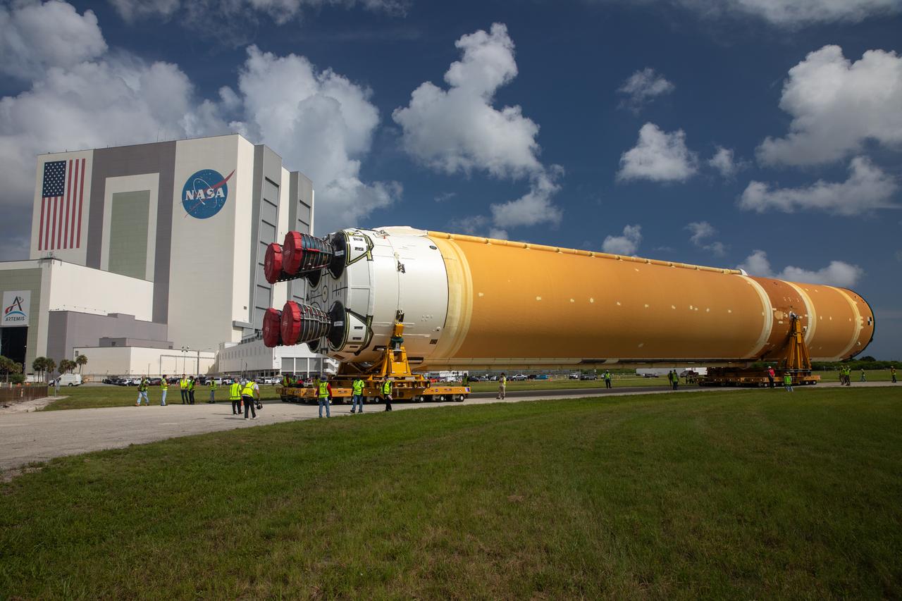 After completing its journey from NASA’s Michoud Assembly Facility in New Orleans aboard the Pegasus barge, teams with Exploration Ground Systems (EGS) transport the agency’s powerful SLS (Space Launch System) core stage to Kennedy Space Center’s Vehicle Assembly Building in Florida on Wednesday, July 24, 2024. Once inside, SLS will be prepared for integration atop the mobile launcher ahead of the Artemis II launch. 