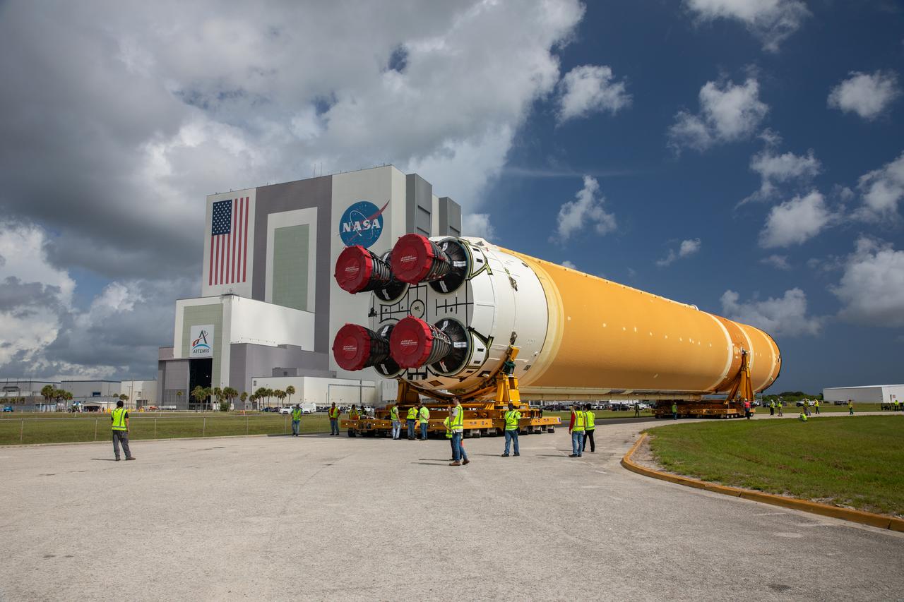 After completing its journey from NASA’s Michoud Assembly Facility in New Orleans aboard the Pegasus barge, teams with Exploration Ground Systems (EGS) transport the agency’s powerful SLS (Space Launch System) core stage to Kennedy Space Center’s Vehicle Assembly Building in Florida on Wednesday, July 24, 2024. Once inside, SLS will be prepared for integration atop the mobile launcher ahead of the Artemis II launch. 