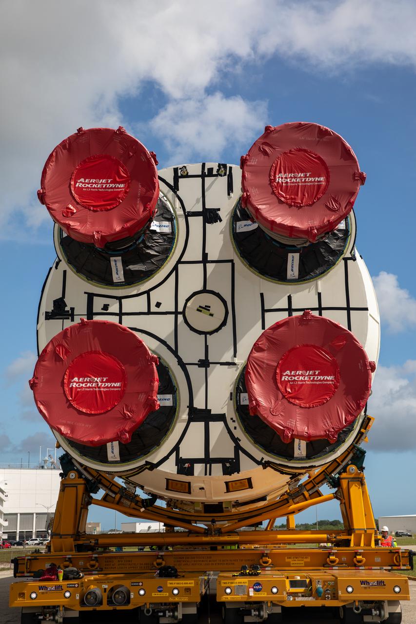 After completing its journey from NASA’s Michoud Assembly Facility in New Orleans aboard the Pegasus barge, teams with Exploration Ground Systems (EGS) transport the agency’s powerful SLS (Space Launch System) core stage to Kennedy Space Center’s Vehicle Assembly Building in Florida on Wednesday, July 24, 2024. Once inside, SLS will be prepared for integration atop the mobile launcher ahead of the Artemis II launch. 