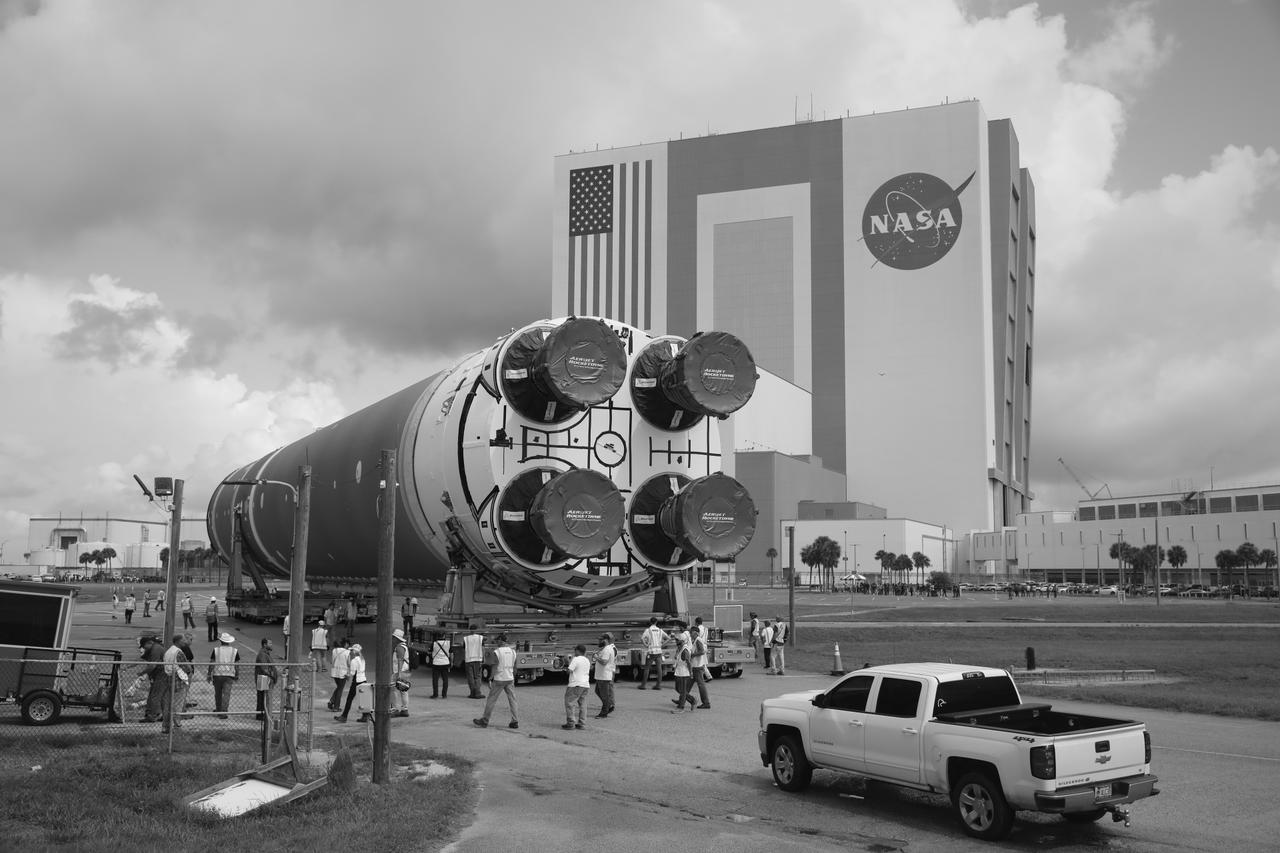 After completing its journey from NASA’s Michoud Assembly Facility in New Orleans aboard the Pegasus barge, teams with Exploration Ground Systems (EGS) transport the agency’s powerful SLS (Space Launch System) core stage to Kennedy Space Center’s Vehicle Assembly Building in Florida on Wednesday, July 24, 2024. Once inside, SLS will be prepared for integration atop the mobile launcher ahead of the Artemis II launch. 
