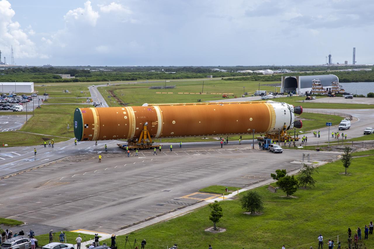 After completing its journey from NASA’s Michoud Assembly Facility in New Orleans aboard the Pegasus barge, teams with Exploration Ground Systems (EGS) transport the agency’s powerful SLS (Space Launch System) core stage to NASA’s Kennedy Space Center’s Vehicle Assembly Building in Florida on Wednesday, July 24, 2024. Once inside, SLS will be prepared for integration atop the mobile launcher ahead of the Artemis II launch. 