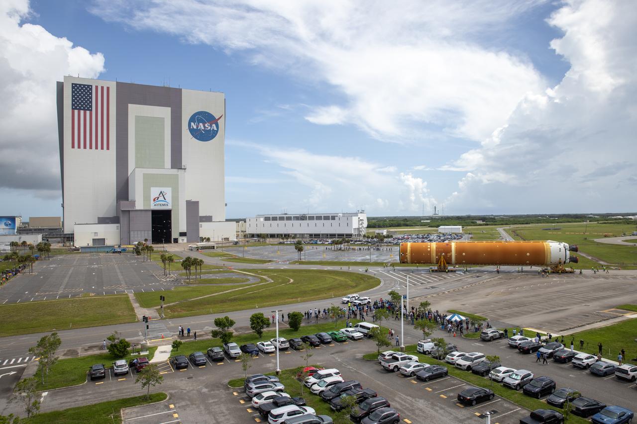 After completing its journey from NASA’s Michoud Assembly Facility in New Orleans aboard the Pegasus barge, teams with Exploration Ground Systems (EGS) transport the agency’s powerful SLS (Space Launch System) core stage to NASA’s Kennedy Space Center’s Vehicle Assembly Building in Florida on Wednesday, July 24, 2024. Once inside, SLS will be prepared for integration atop the mobile launcher ahead of the Artemis II launch. 