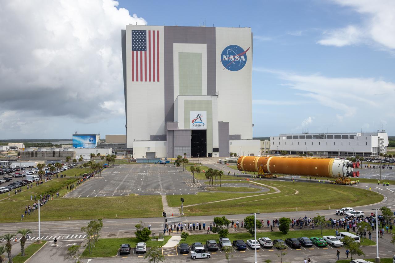After completing its journey from NASA’s Michoud Assembly Facility in New Orleans aboard the Pegasus barge, teams with Exploration Ground Systems (EGS) transport the agency’s powerful SLS (Space Launch System) core stage to NASA’s Kennedy Space Center’s Vehicle Assembly Building in Florida on Wednesday, July 24, 2024. Once inside, SLS will be prepared for integration atop the mobile launcher ahead of the Artemis II launch. 