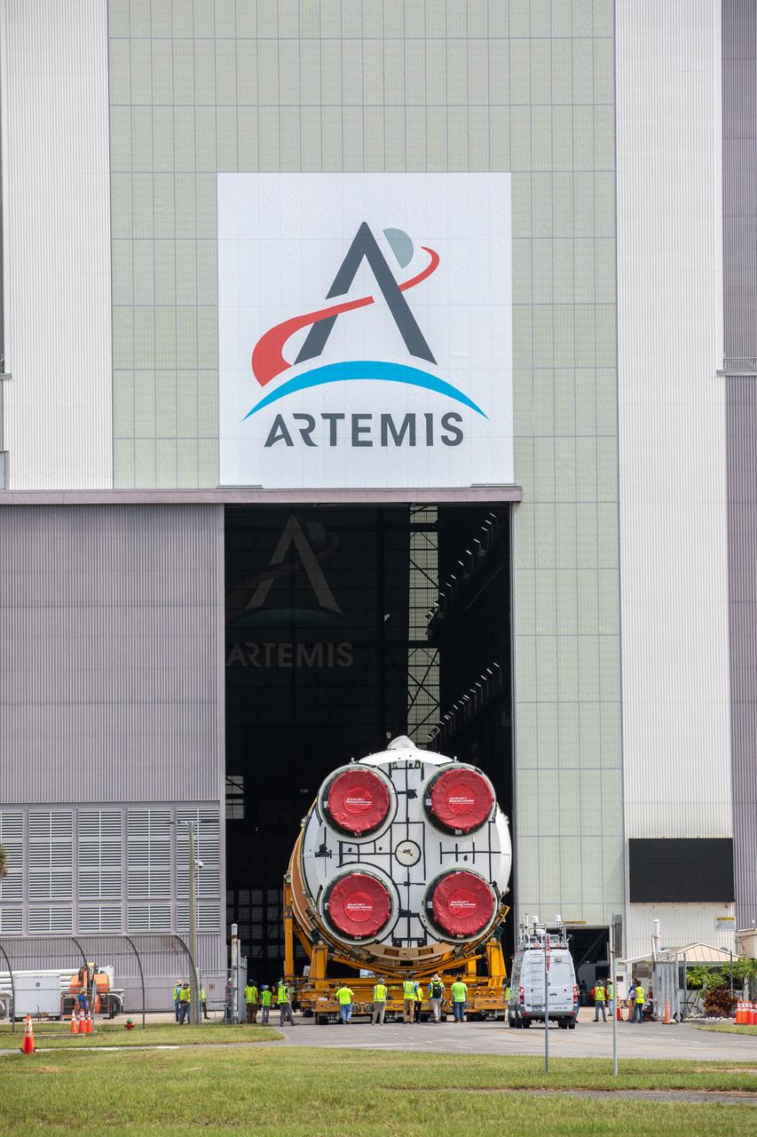 After completing its journey from NASA’s Michoud Assembly Facility in New Orleans aboard the Pegasus barge, teams with Exploration Ground Systems (EGS) transport the agency’s powerful SLS (Space Launch System) core stage to NASA’s Kennedy Space Center’s Vehicle Assembly Building in Florida on Wednesday, July 24, 2024. Once inside, SLS will be prepared for integration atop the mobile launcher ahead of the Artemis II launch. 