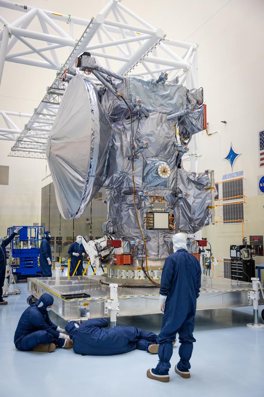 Technicians move NASA’s Europa Clipper spacecraft inside the Payload Hazardous Servicing Facility to accommodate installation of its five-panel solar array at the agency’s Kennedy Space Center in Florida on Thursday, Aug. 1, 2024. After moving the spacecraft, the team had to precisely align the spacecraft in preparation for the installation. The huge arrays – spanning more than 100 feet when fully deployed, or about the length of a basketball court – will collect sunlight to power the spacecraft as it flies multiple times around Jupiter’s icy moon, Europa, conducting science investigations to determine its potential to support life.