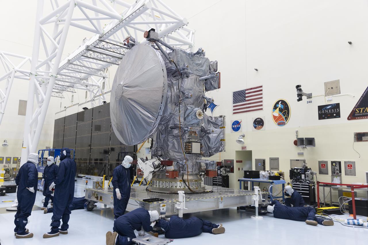 Technicians move NASA’s Europa Clipper spacecraft inside the Payload Hazardous Servicing Facility to accommodate installation of its five-panel solar array at the agency’s Kennedy Space Center in Florida on Thursday, Aug. 1, 2024. After moving the spacecraft, the team had to precisely align the spacecraft in preparation for the installation. The huge arrays – spanning more than 100 feet when fully deployed, or about the length of a basketball court – will collect sunlight to power the spacecraft as it flies multiple times around Jupiter’s icy moon, Europa, conducting science investigations to determine its potential to support life.