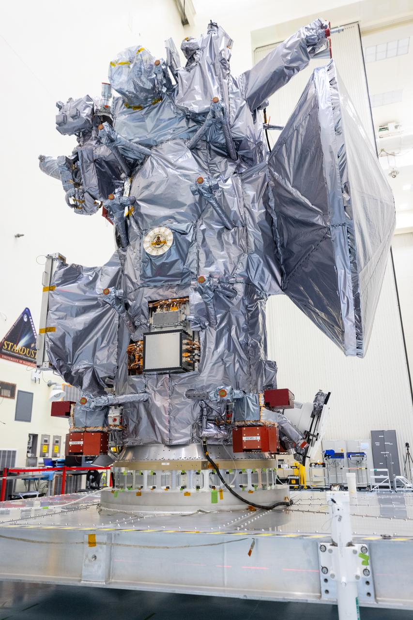 Technicians move NASA’s Europa Clipper spacecraft inside the Payload Hazardous Servicing Facility to accommodate installation of its five-panel solar array at the agency’s Kennedy Space Center in Florida on Thursday, Aug. 1, 2024. After moving the spacecraft, the team had to precisely align the spacecraft in preparation for the installation. The huge arrays – spanning more than 100 feet when fully deployed, or about the length of a basketball court – will collect sunlight to power the spacecraft as it flies multiple times around Jupiter’s icy moon, Europa, conducting science investigations to determine its potential to support life.