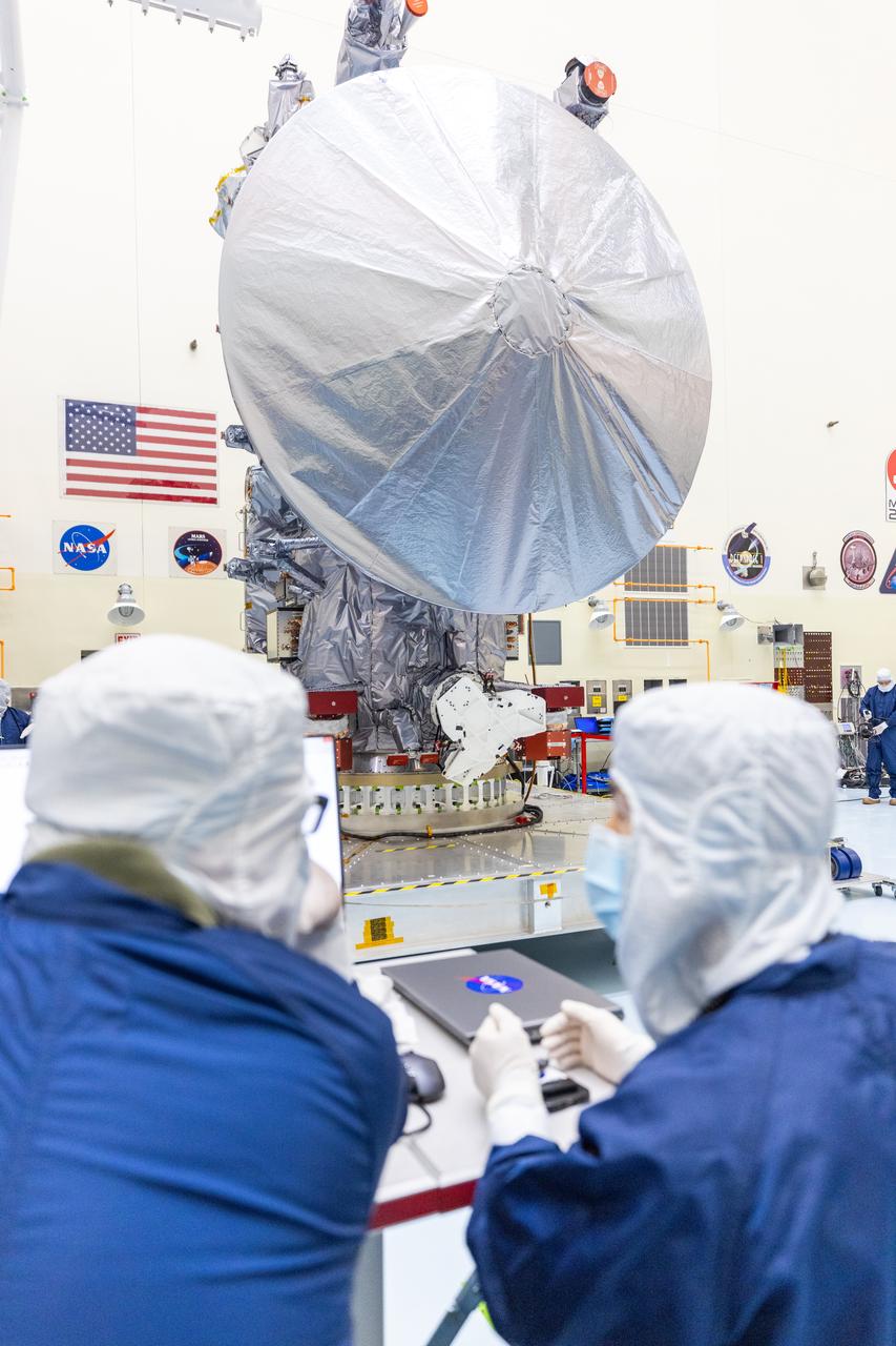 Technicians move NASA’s Europa Clipper spacecraft inside the Payload Hazardous Servicing Facility to accommodate installation of its five-panel solar array at the agency’s Kennedy Space Center in Florida on Thursday, Aug. 1, 2024. After moving the spacecraft, the team had to precisely align the spacecraft in preparation for the installation. The huge arrays – spanning more than 100 feet when fully deployed, or about the length of a basketball court – will collect sunlight to power the spacecraft as it flies multiple times around Jupiter’s icy moon, Europa, conducting science investigations to determine its potential to support life.