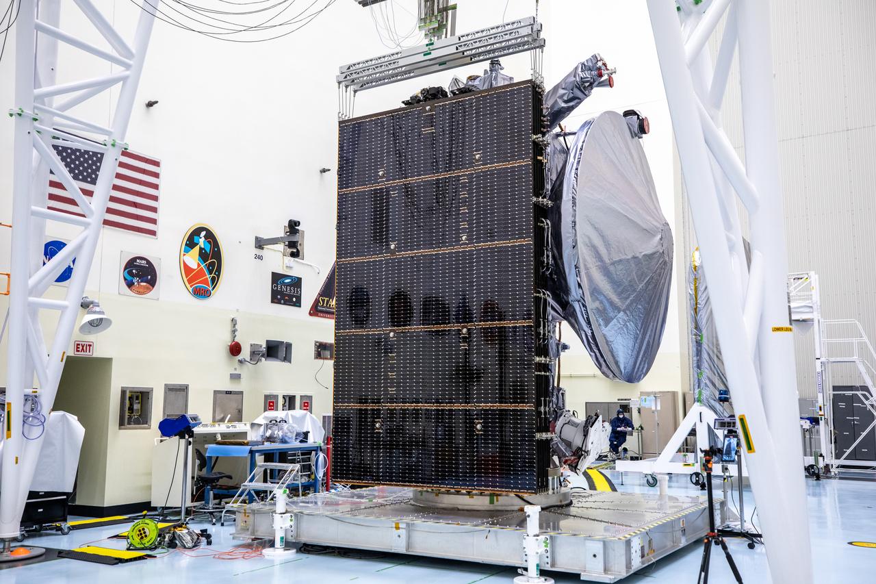 Technicians tested deploying a set of massive solar arrays measuring about 46.5 feet (14.2 meters) long and about 13.5 feet (4.1 meters) high for NASA’s Europa Clipper spacecraft inside the agency’s Payload Hazardous Servicing Facility at Kennedy Space Center in Florida on Wednesday, Aug. 7, 2024. Once launched to study Jupiter’s icy moon, Europa, the solar arrays will fully extend to power the spacecraft to perform  flybys to gather science and data to determine if the moon can support habitable conditions. 