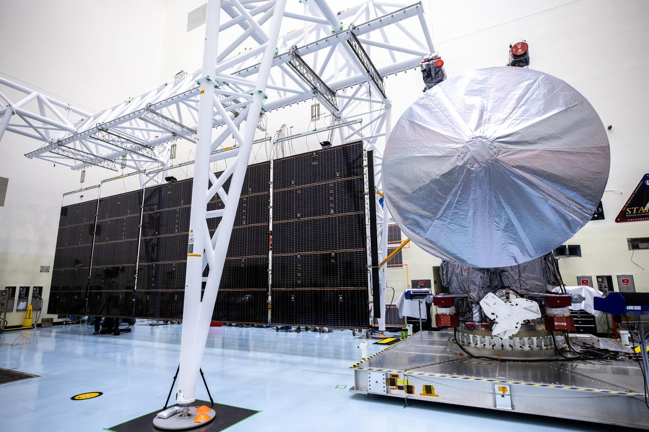 Technicians tested deploying a set of massive solar arrays measuring about 46.5 feet (14.2 meters) long and about 13.5 feet (4.1 meters) high for NASA’s Europa Clipper spacecraft inside the agency’s Payload Hazardous Servicing Facility at Kennedy Space Center in Florida on Wednesday, Aug. 7, 2024. Once launched to study Jupiter’s icy moon, Europa, the solar arrays will fully extend to power the spacecraft to perform  flybys to gather science and data to determine if the moon can support habitable conditions. 