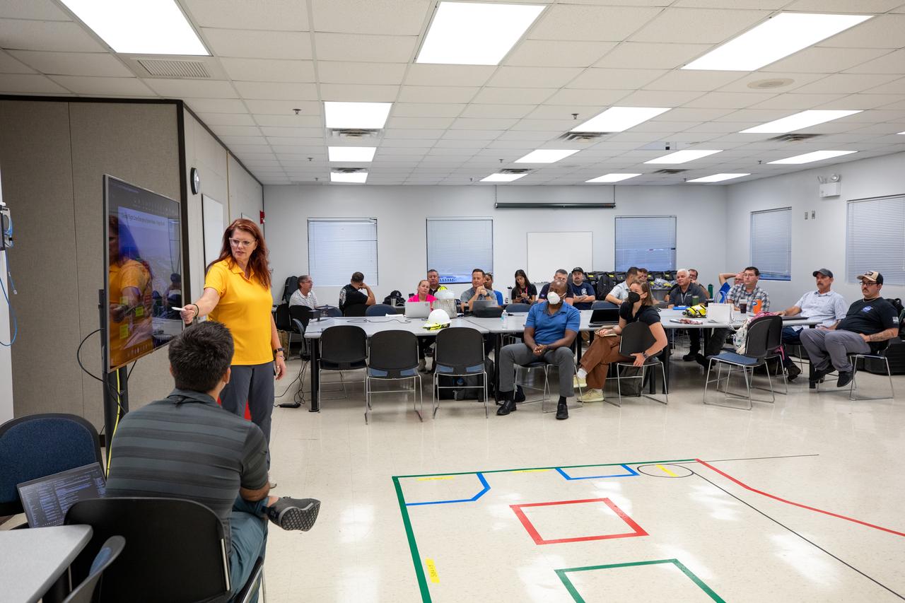 NASA Artemis Launch Director Charlie Blackwell-Thompson participates in an Artemis II classroom training on the Artemis emergency egress system with teams from the agency’s Exploration Ground Systems Program and others on Thursday, Aug. 8, 2024, at NASA’s Kennedy Space Center in Florida. Teams are training for the Artemis emergency egress demonstration as part of a series of integrated system verification and validation tests conducted at Kennedy to ensure teams are ready for launch. 