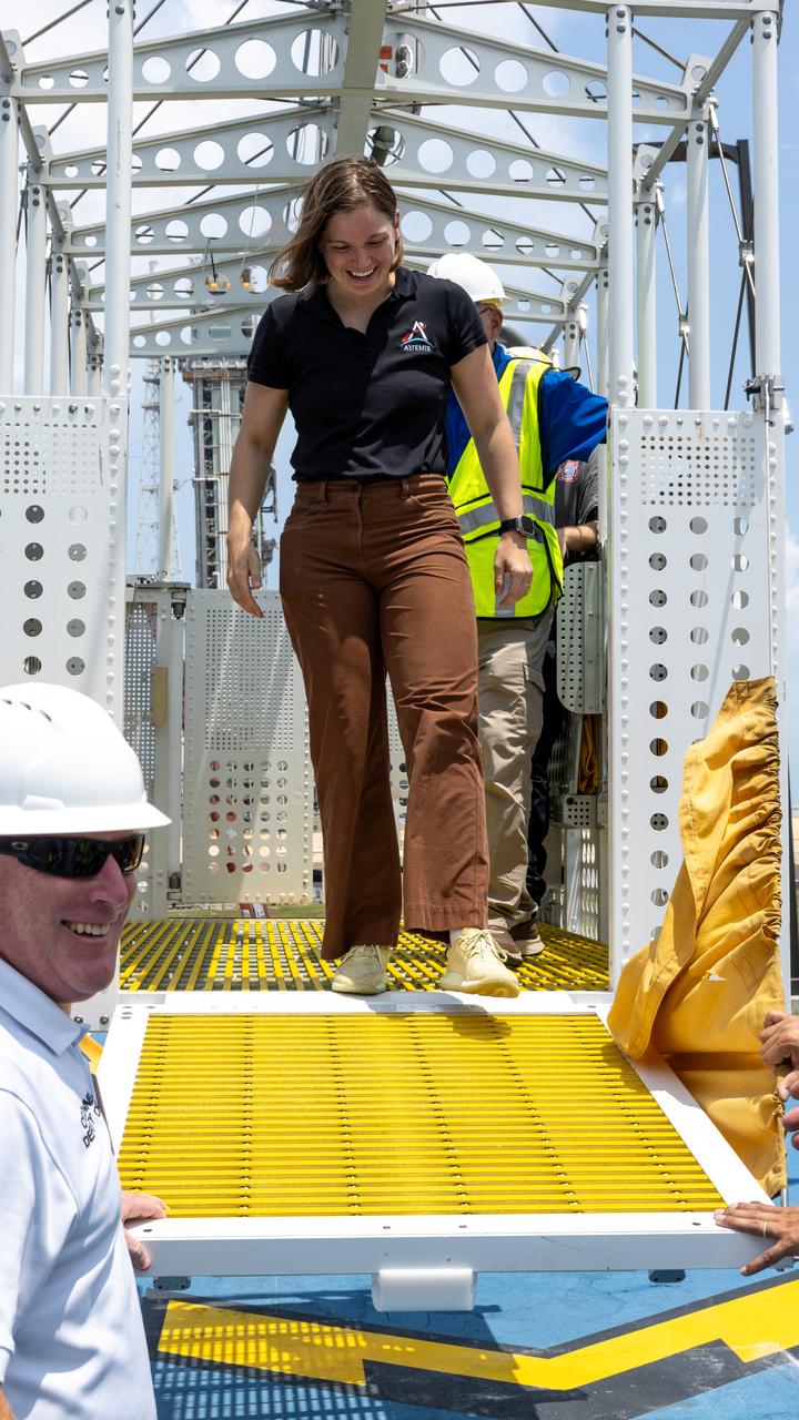 Artemis II backup crew member, CSA (Canadian Space Agency) astronaut Jenni Gibbons, participates in the Artemis II emergency egress demonstration, which is one of the integrated system verification and validation tests taking place at Launch Complex 39B at the agency’s Kennedy Space Center in Florida on Thursday, Aug. 8, 2024. The baskets, similar to gondolas on ski lifts, are used in the case of a pad abort emergency to enable astronauts and other pad personnel a way to quickly escape away from the mobile launcher to the base of the pad and where waiting emergency transport vehicles will then drive them away. 