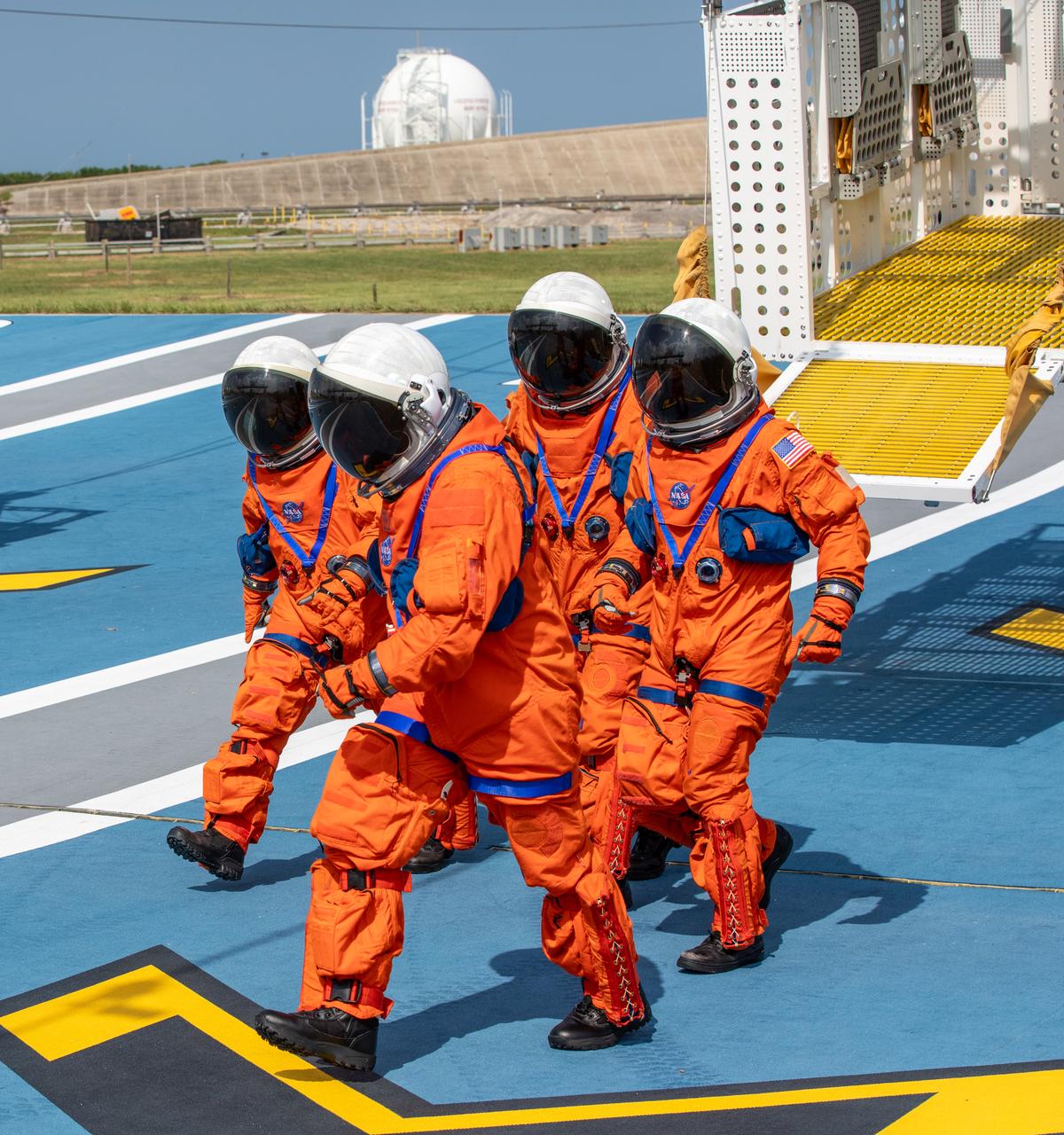 Teams at NASA’s Kennedy Space Center in Florida practice the Artemis mission emergency escape or egress procedures during a series of integrated system verification and validation tests at Launch Complex 39B on Friday, Aug. 9, 2024. Simulated flight crew members practice getting out of the emergency egress basket and into the emergency transport vehicle to drive them to safety in the event of an unlikely emergency during launch countdown.
