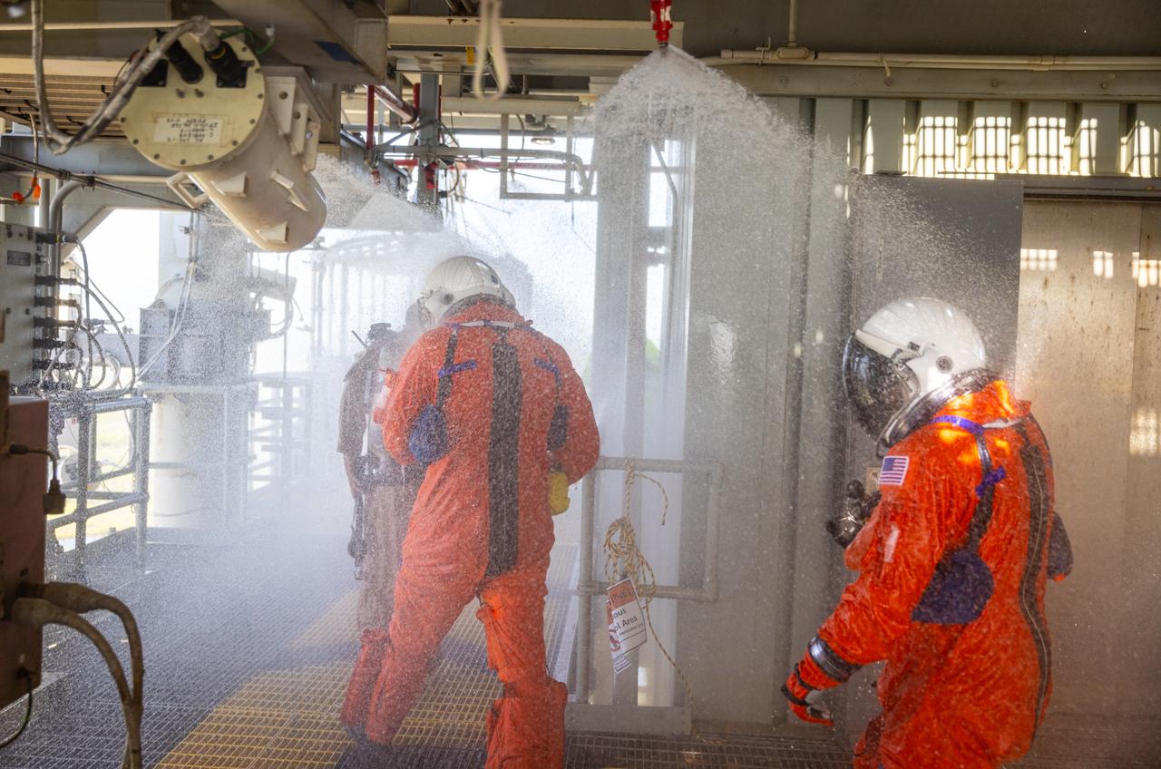 Teams at NASA’s Kennedy Space Center in Florida practice the Artemis mission emergency escape or egress procedures during a series of integrated system verification and validation tests at Launch Pad 39B on Monday, Aug. 12, 2024. Members of the closeout crew, pad rescue team and the Exploration Ground Systems Program practiced the process of getting inside and out of the emergency egress baskets. While the crew and other personnel will ride the emergency egress baskets to the terminus area in a real emergency, no one rode the baskets for this test. Instead, teams tested the baskets during separate occasions by using water tanks filled to different levels to replicate simulate the weight of passengers.