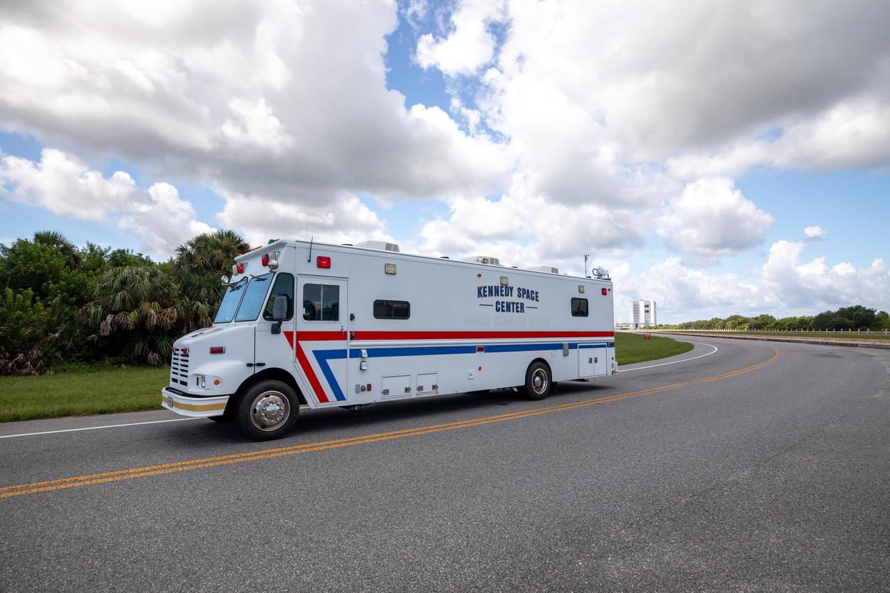 Medical and fire-rescue personnel participate in the Artemis II mission emergency escape or egress verification and validation tests near Launch Complex 39 at NASA's Kennedy Space Center in Florida on Monday, Aug. 12, 2024. During the multi-day tests, members of the closeout crew, pad rescue team, and the Exploration Ground Systems Program practiced the process of getting in and out of the emergency egress baskets then down to the launch pad where they would be transported to emergency transport vehicles and driven to safety. Prior to this test and throughout the course of several months, teams conducted basket release demonstrations to validate the system.