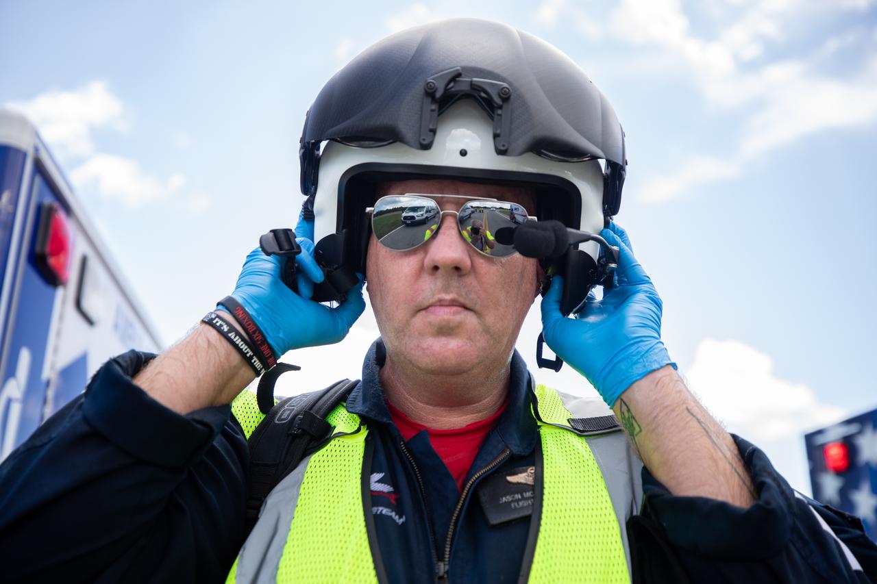Medical and fire-rescue personnel participate in the Artemis II mission emergency escape or egress verification and validation tests near Launch Complex 39 at NASA's Kennedy Space Center in Florida on Monday, Aug. 12, 2024. During the multi-day tests, members of the closeout crew, pad rescue team, and the Exploration Ground Systems Program practiced the process of getting in and out of the emergency egress baskets then down to the launch pad where they would be transported to emergency transport vehicles and driven to safety. Prior to this test and throughout the course of several months, teams conducted basket release demonstrations to validate the system.