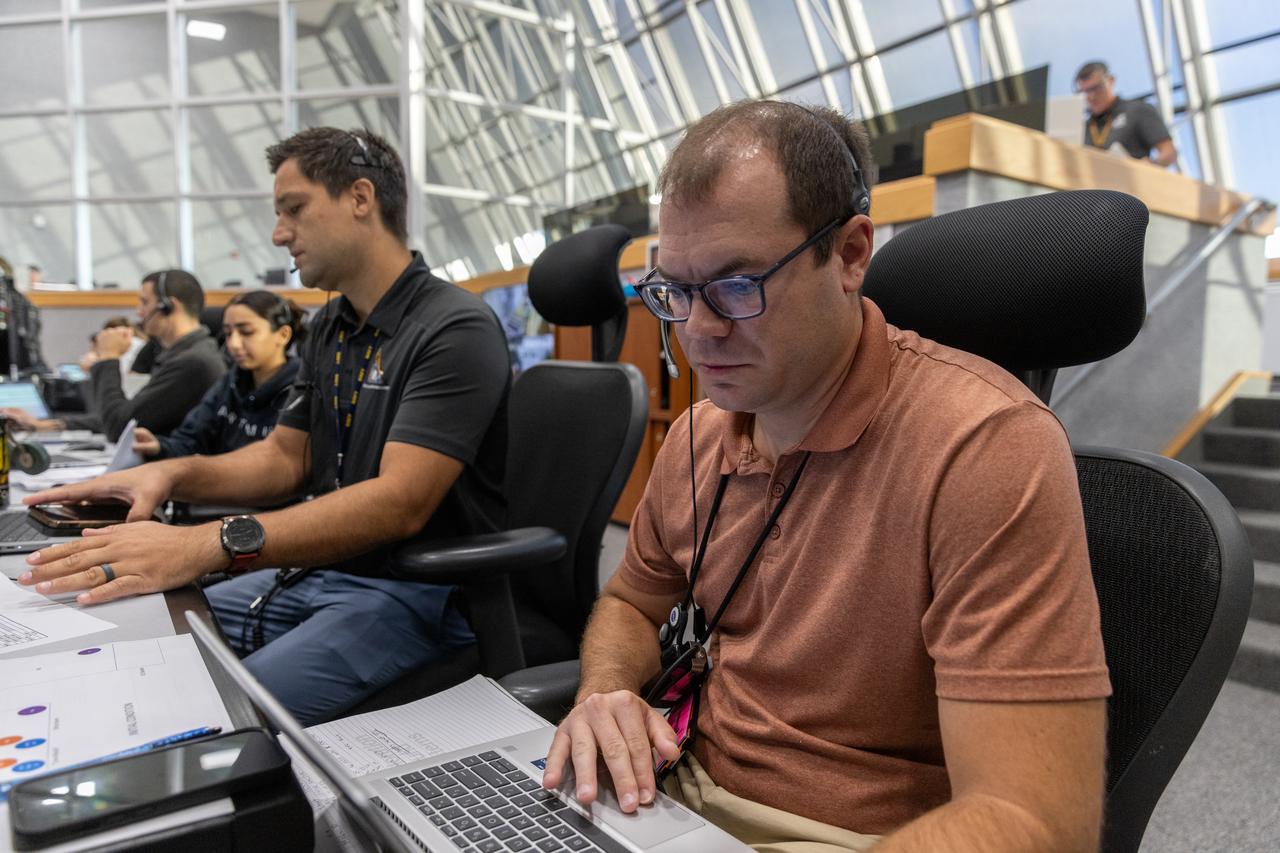 Jeremy Graeber, Artemis assistant launch director, Exploration Ground Systems at NASA’s Kennedy Space Center in Florida, participates in an emergency escape or egress demonstration simulation for the Artemis II mission inside Firing Room 1 in the Launch Control Center at NASA’s Kennedy on Monday, Aug. 12, 2024. Other members of the closeout crew, pad rescue team, and the Exploration Ground Systems Program performed emergency egress demonstrations during a series of integrated system verification tests at Launch Pad 39B in preparation for the Artemis II launch.