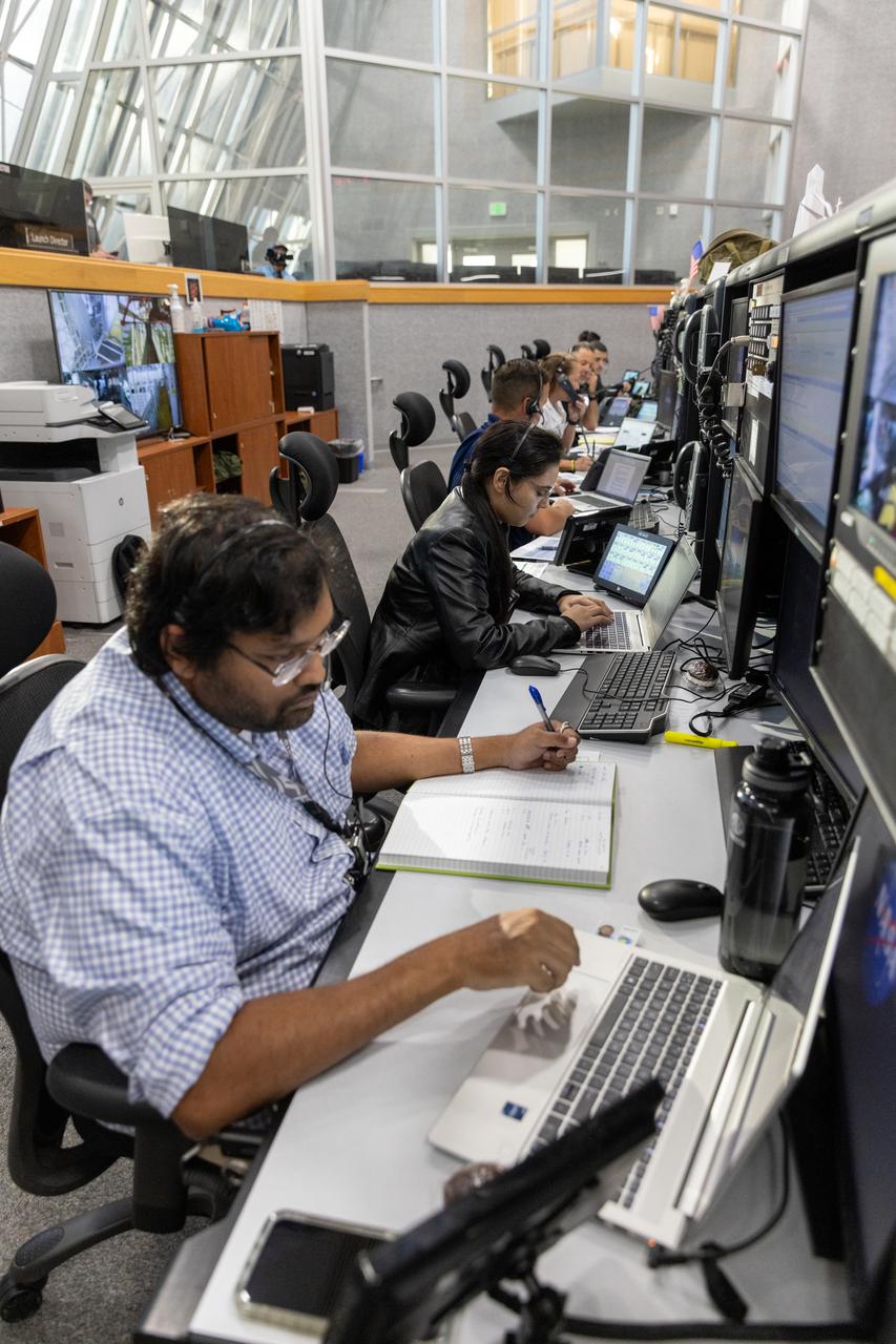 Members of the Artemis II launch team, including personnel with NASA’s Exploration Ground Systems participate in an emergency escape or egress demonstration simulation for the Artemis II mission inside Firing Room 1 in the Launch Control Center at NASA’s Kennedy on Monday, Aug. 12, 2024. Other members of the closeout crew, pad rescue team, and the Exploration Ground Systems Program performed emergency egress demonstrations during a series of integrated system verification tests at Launch Pad 39B in preparation for the Artemis II launch.