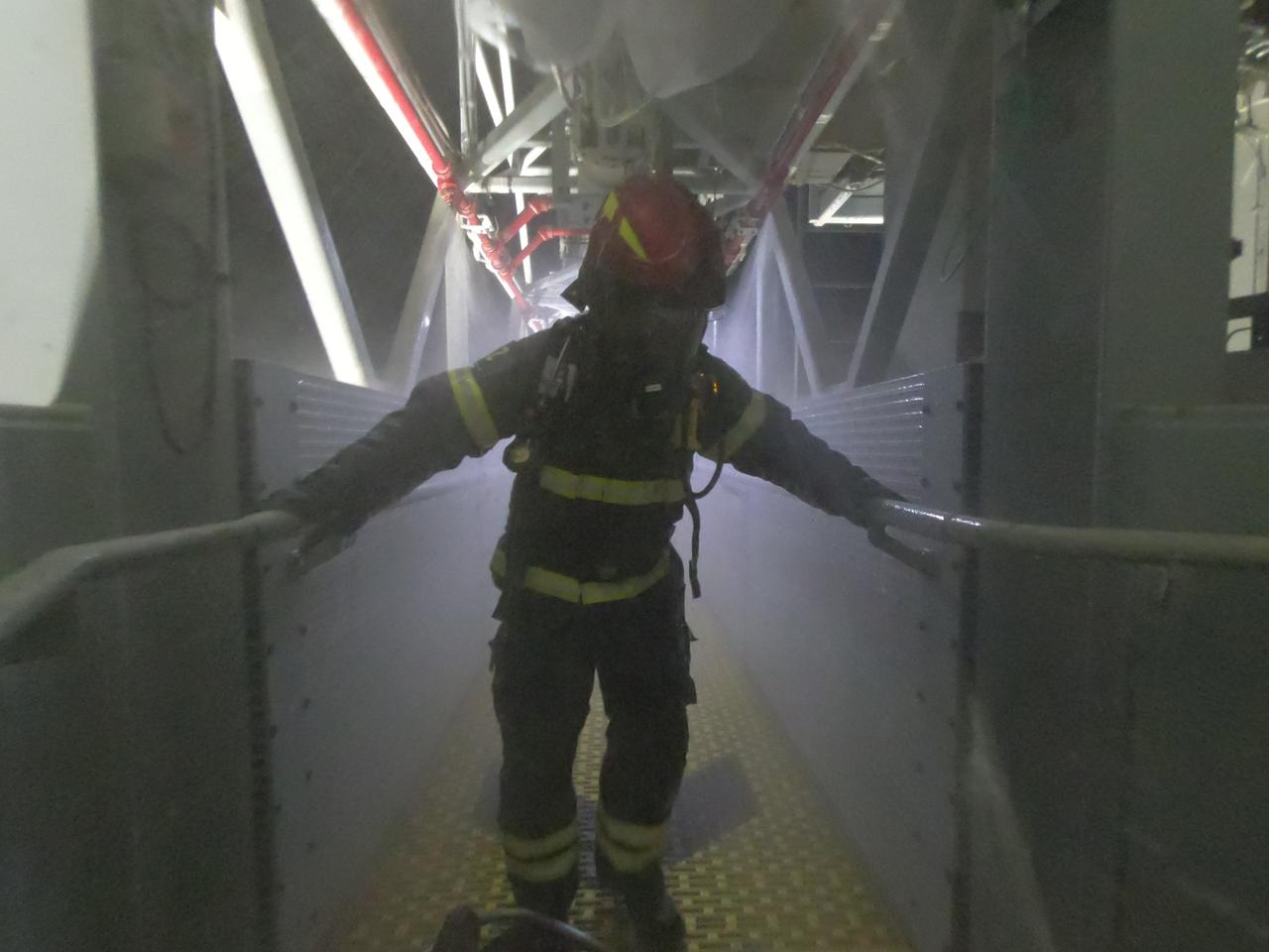 Teams at NASA’s Kennedy Space Center in Florida practice the Artemis mission emergency escape or egress procedures during a series of integrated system verification and validation tests at Launch Pad 39B on Tuesday, Aug. 13, 2024. Members of the closeout crew, pad rescue team, and the Exploration Ground Systems Program – who also suited up as astronauts – practiced the process of getting inside and out of the emergency egress baskets. While the crew and other personnel will ride the emergency egress baskets to the terminus area in a real emergency, no one rode the baskets for this test. Instead, teams tested the baskets during separate occasions by using water tanks filled to different levels to replicate simulate the weight of passengers.