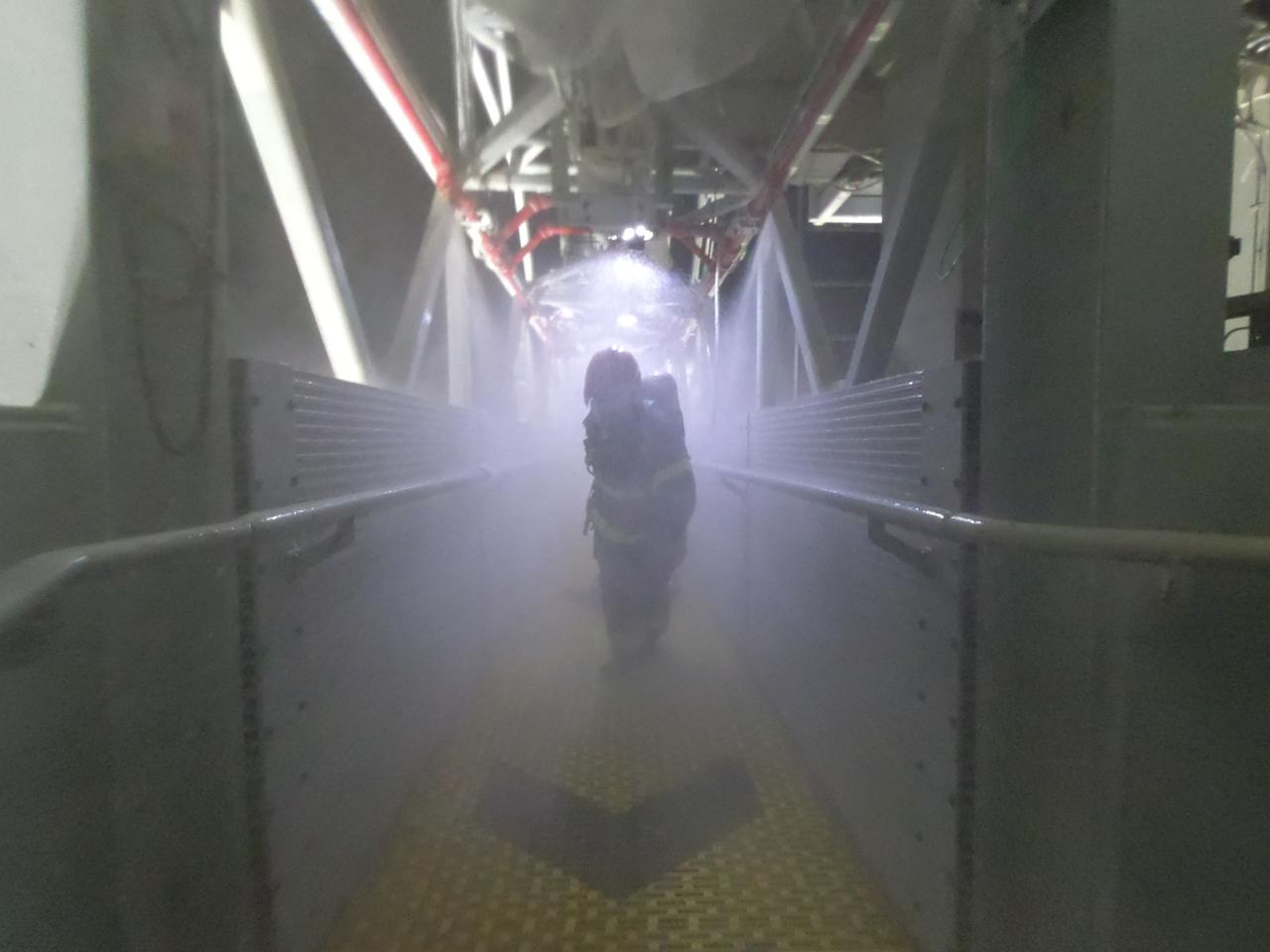 Teams at NASA’s Kennedy Space Center in Florida practice the Artemis mission emergency escape or egress procedures during a series of integrated system verification and validation tests at Launch Pad 39B on Tuesday, Aug. 13, 2024. Members of the closeout crew, pad rescue team, and the Exploration Ground Systems Program – who also suited up as astronauts – practiced the process of getting inside and out of the emergency egress baskets. While the crew and other personnel will ride the emergency egress baskets to the terminus area in a real emergency, no one rode the baskets for this test. Instead, teams tested the baskets during separate occasions by using water tanks filled to different levels to replicate simulate the weight of passengers.