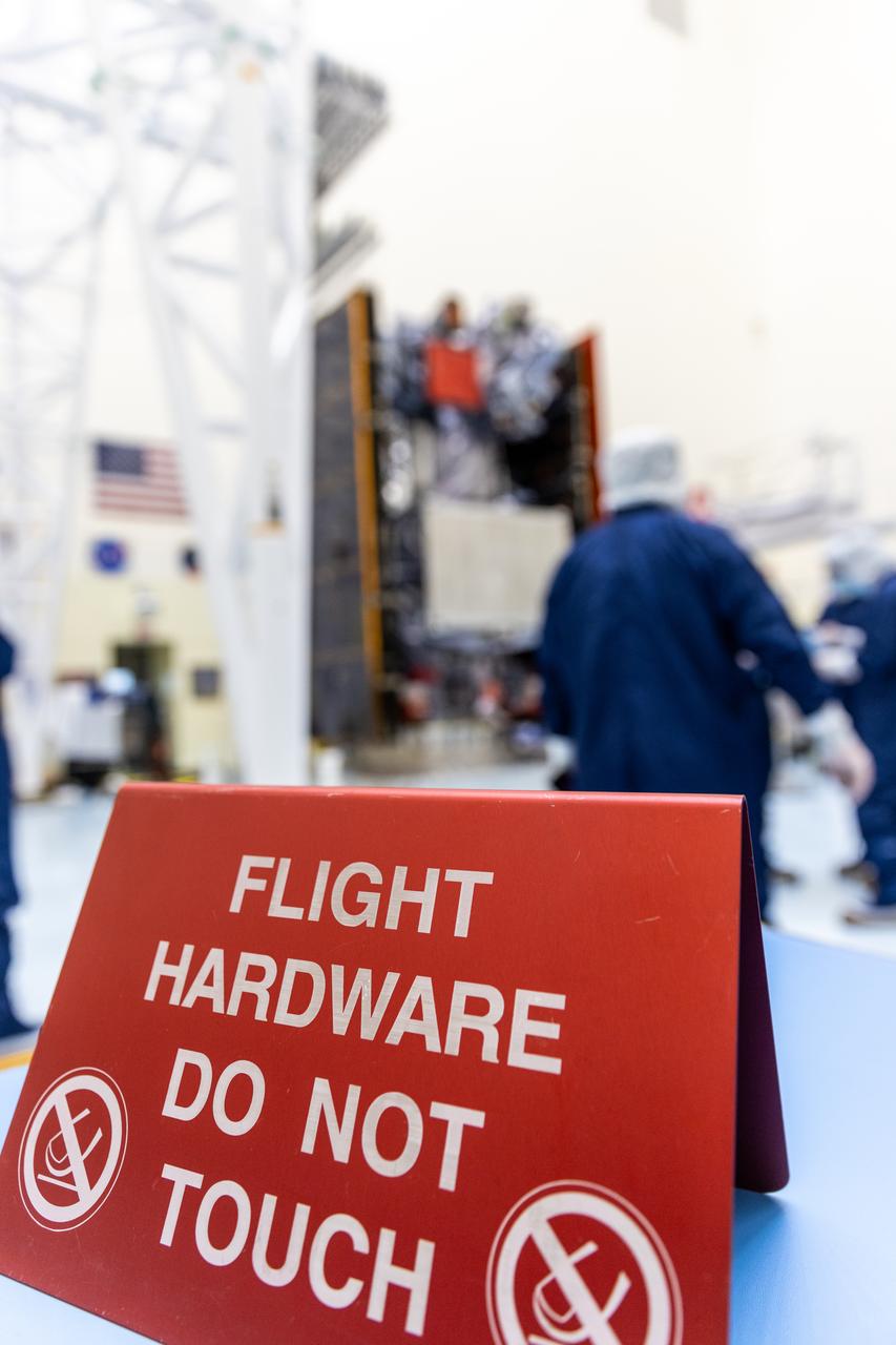 Technicians test the system to deploy NASA’s Europa Clipper spacecraft solar arrays, which uses “thermal knives” to cut the restraints holding the solar arrays in place inside the agency’s Payload Hazardous Servicing Facility at Kennedy Space Center in Florida on Wednesday, Aug. 21, 2024. The Europa Clipper spacecraft will travel to Jupiter’s icy moon to determine its potential to support life. After launch the thermal knives will cut the restraints, allowing the solar arrays to deploy and collect sunlight to power the spacecraft as it begins its journey to investigate Europa.