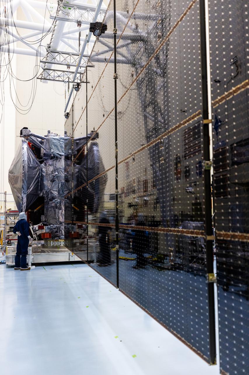 Technicians test the system to deploy NASA’s Europa Clipper spacecraft solar arrays, which uses “thermal knives” to cut the restraints holding the solar arrays in place inside the agency’s Payload Hazardous Servicing Facility at Kennedy Space Center in Florida on Wednesday, Aug. 21, 2024. The Europa Clipper spacecraft will travel to Jupiter’s icy moon to determine its potential to support life. After launch the thermal knives will cut the restraints, allowing the solar arrays to deploy and collect sunlight to power the spacecraft as it begins its journey to investigate Europa.
