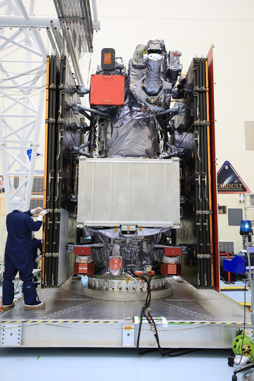 Technicians test, retract, and stow one of the two “wings” comprising the solar arrays for NASA’s Europa Clipper spacecraft on Friday, Aug. 23, 2024, at the Payload Hazardous Servicing Facility at the agency’s Kennedy Space Center in Florida. Each array measures about 46.5 feet (14.2 meters) long and about 13.5 feet (4.1 meters) high when extended. The spacecraft needs the massive solar arrays to power to Jupiter’s icy moon Europa to help scientists better understand the astrobiological potential for habitable worlds beyond our planet.