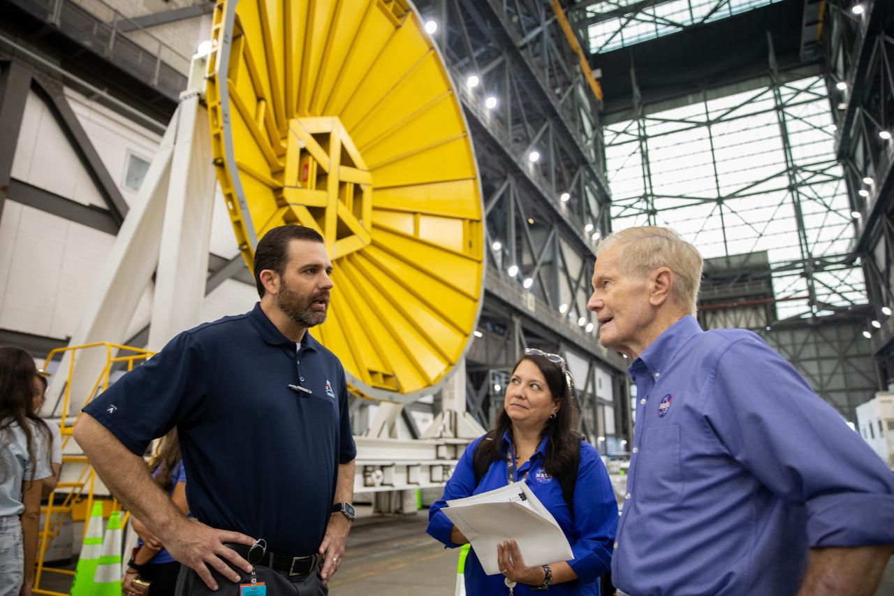 NASA Administrator Bill Nelson and NASA Exploration Ground Systems Program Deputy Manager Jeremy Parsons visit the agency’s SLS (Space Launch System) rocket core stage for the Artemis II mission inside NASA’s Kennedy Space Center in Florida on Thursday, Aug. 29, 2024. In the coming months, teams will integrate the rocket core stage atop the mobile launcher with the additional Artemis II flight hardware, including the twin solid rocket boosters, launch vehicle stage adapter, and the Orion spacecraft.