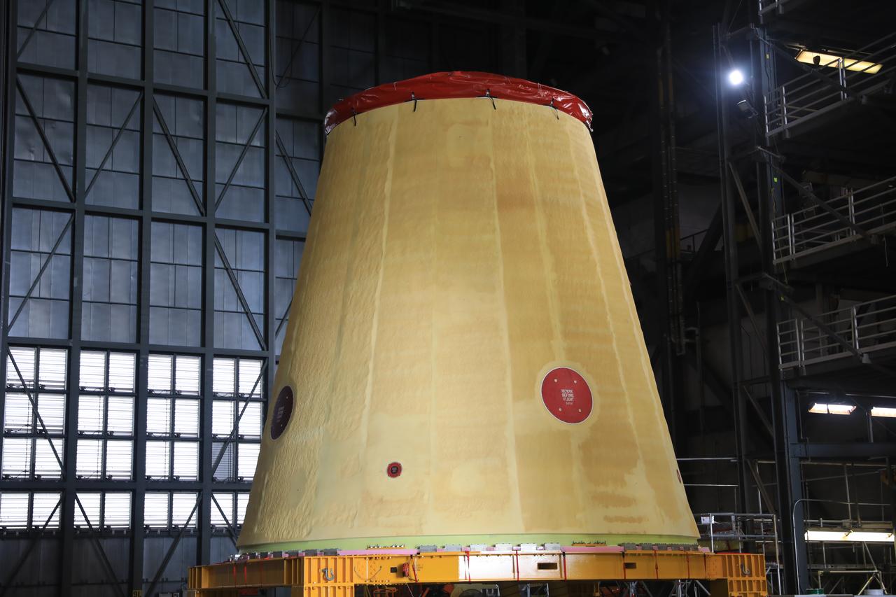 NASA’s Artemis II hardware, the launch vehicle stage adapter, awaits stacking operations at the Vehicle Assembly Building at NASA’s Kennedy Space Center in Florida on Monday, Sept. 9, 2024. The cone shaped launch vehicle stage adapter connects to NASA’s SLS (Space Launch System) rocket to the upper stage, the interim cryogenic propulsion stage, and protects the rocket’s flight computers, avionics, and electrical devices during launch and ascent. 