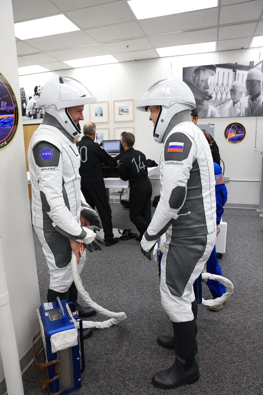 NASA’s SpaceX Crew-9 crew members, NASA astronaut Nick Hague (left) and Roscosmos cosmonaut Aleksandr Gorbunov, participate in a countdown dress rehearsal inside the crew suit-up room of the Neil A. Armstrong Operations and Checkout Building at the agency’s Kennedy Space Center in Florida on Tuesday, Sept. 24, 2024, to prepare for the upcoming Crew-9 launch. Hague and Gorbunov will launch to the International Space Station aboard SpaceX’s Dragon spacecraft and Falcon 9 rocket. Launch is targeted for 1:17 p.m. EDT Saturday, Sept. 28, 2024, from Space Launch Complex-40 at Cape Canaveral Space Force Station in Florida. Crew-9 is the ninth crew rotation mission with SpaceX to the space station as part of the agency’s Commercial Crew Program.