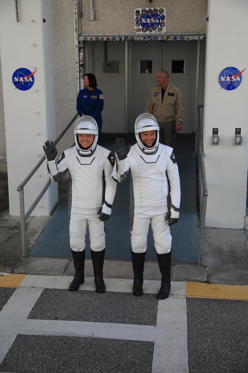 NASA’s SpaceX Crew-9 crew members, NASA astronaut Nick Hague (right) and Roscosmos cosmonaut Aleksandr Gorbunov, walk out of the Neil A. Armstrong Operations and Checkout Building at the agency’s Kennedy Space Center in Florida during a countdown dress rehearsal on Tuesday, Sept. 24, 2024, to prepare for the upcoming Crew-9 launch. Hague and Gorbunov will launch to the International Space Station aboard SpaceX’s Dragon spacecraft and Falcon 9 rocket. Launch is targeted for 1:17 p.m. EDT Saturday, Sept. 28, 2024, from Space Launch Complex-40 at Cape Canaveral Space Force Station in Florida. Crew-9 is the ninth crew rotation mission with SpaceX to the space station as part of the agency’s Commercial Crew Program. 