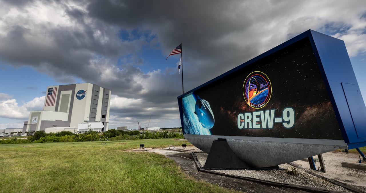 A graphic for NASA’s SpaceX Crew-9 mission is displayed on the historic countdown clock at the NASA News Center at the agency’s Kennedy Space Center in Florida on Tuesday, Sept. 24, 2024. The Crew-9 mission will send NASA astronaut Nick Hague and Roscosmos cosmonaut Aleksandr Gorbunov to the International Space Station aboard SpaceX’s Dragon spacecraft and Falcon 9 rocket. Launch is targeted for 1:17 p.m. EDT Saturday, Sept. 28, 2024, from Space Launch Complex-40 at Cape Canaveral Space Force Station in Florida. 