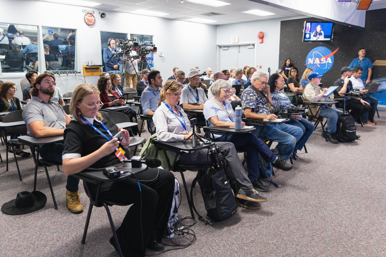Members of the media attend an International Space Station 101 Panel Livestream inside the John Holliman Auditorium of the News Center at the agency’s Kennedy Space Center in Florida on Friday, Sept. 27, 2024, ahead of NASA’s SpaceX Crew-9 mission to the International Space Station. Liftoff of the ninth crew rotation mission with SpaceX to the space station as part of the agency’s Commercial Crew Program is targeted for 1:17 p.m. EDT Sept. 28, 2024, from Space Launch Complex-40 at Cape Canaveral Space Force Station in Florida.