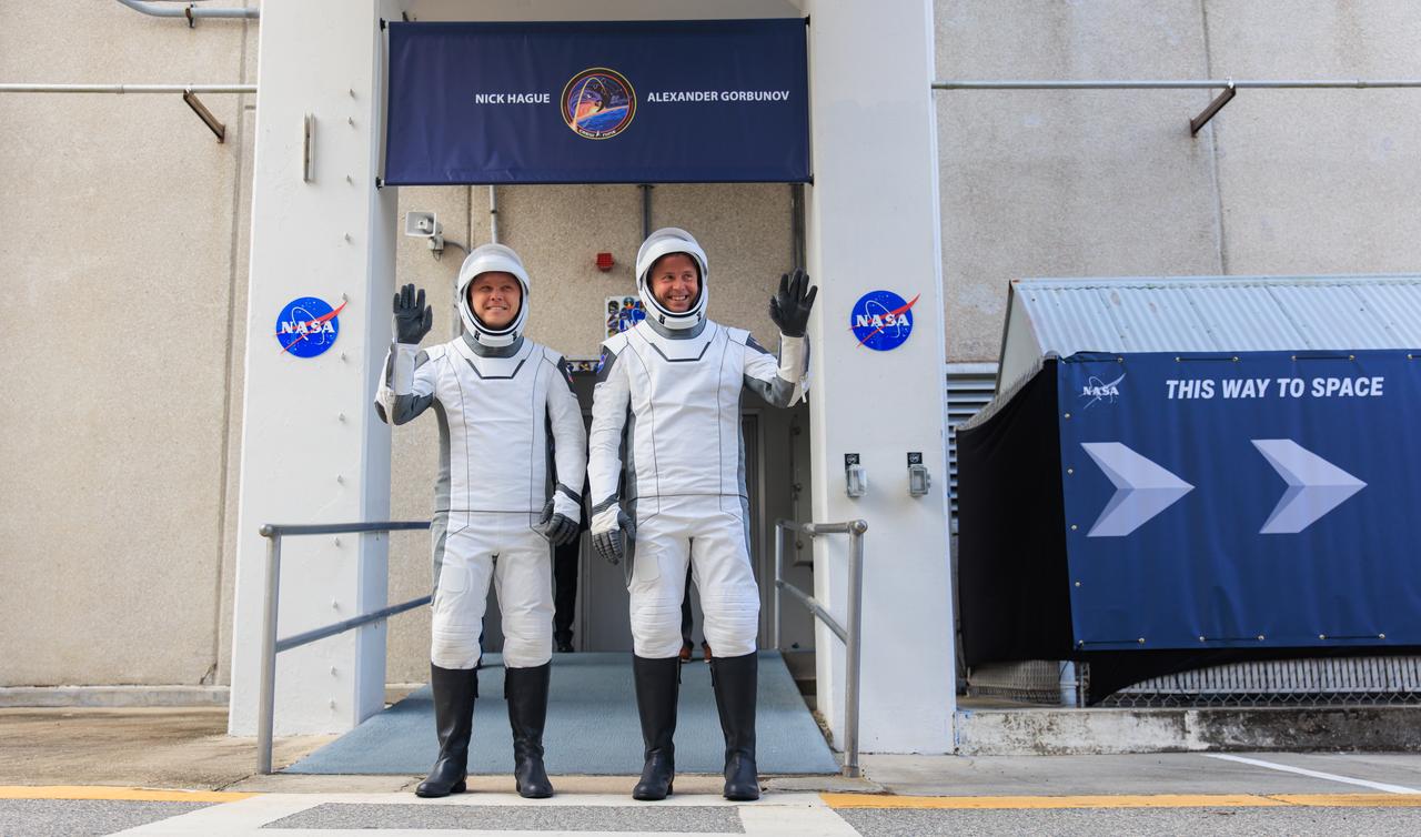 NASA’s SpaceX Crew-9 crew members wave to family and friends as they prepare to depart the Neil A. Armstrong Operations and Checkout Building at the agency’s Kennedy Space Center in Florida for nearby Space Launch Complex-40 at Cape Canaveral Space Force Station for launch of Crew-9 on Saturday, Sept. 28, 2024. NASA astronaut Nick Hague (lright) and Roscosmos cosmonaut Aleksandr Gorbunov will launch to the International Space Station aboard SpaceX’s Dragon spacecraft and Falcon 9 rocket. Launch is targeted for 1:17 p.m. EDT for the ninth crew rotation mission with SpaceX to the space station as part of the agency’s Commercial Crew Program. 