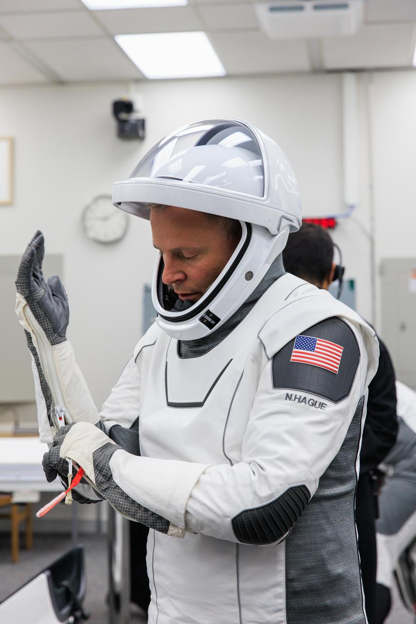 NASA astronaut Nick Hague is photographed in his SpaceX spacesuit inside the crew suit-up room in the Neil A. Armstrong Operations and Checkout Building at the agency’s Kennedy Space Center in Florida ahead of launch of NASA’s SpaceX Crew-9 mission on Saturday, Sept. 28, 2024. Hague and Roscosmos cosmonaut Aleksandr Gorbunov will launch to the International Space Station aboard SpaceX’s Dragon spacecraft and Falcon 9 rocket. Launch is targeted for 1:17 p.m. EDT from Space Launch Complex-40 at Cape Canaveral Space Force Station in Florida. Crew-9 is the ninth crew rotation mission with SpaceX to the space station as part of the agency’s Commercial Crew Program.
