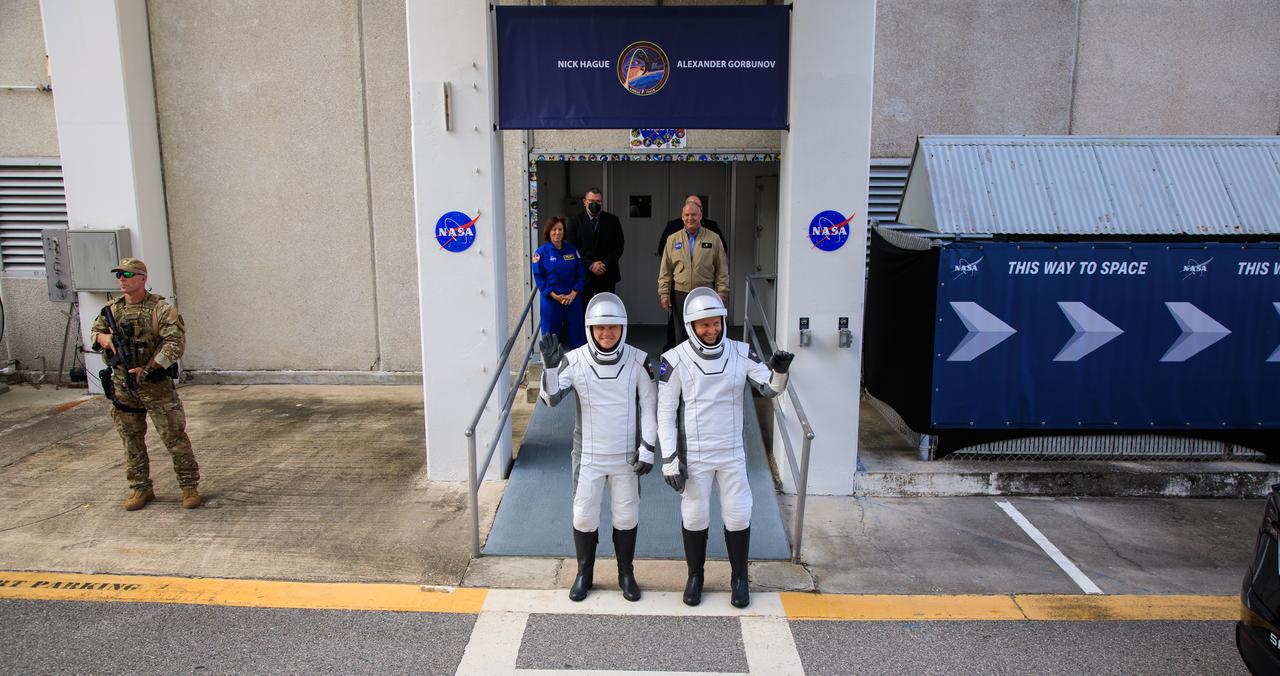 NASA’s SpaceX Crew-9 crew members wave to family and friends as they prepare to depart the Neil A. Armstrong Operations and Checkout Building at the agency’s Kennedy Space Center in Florida for nearby Space Launch Complex-40 at Cape Canaveral Space Force Station for launch of Crew-9 on Saturday, Sept. 28, 2024. NASA astronaut Nick Hague (lright) and Roscosmos cosmonaut Aleksandr Gorbunov will launch to the International Space Station aboard SpaceX’s Dragon spacecraft and Falcon 9 rocket. Launch is targeted for 1:17 p.m. EDT for the ninth crew rotation mission with SpaceX to the space station as part of the agency’s Commercial Crew Program. 