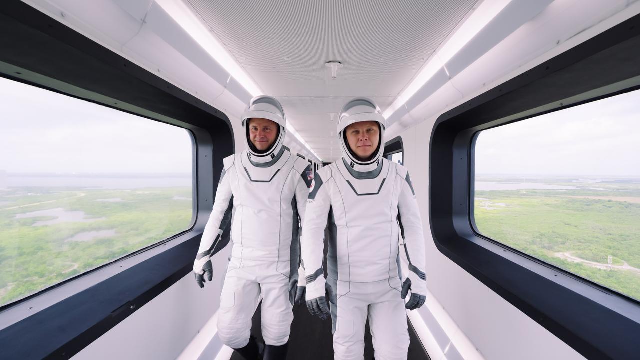 NASA astronaut Nick Hague (left) and Roscosmos cosmonaut Aleksandr Gorbunov walk through the crew access arm connecting the launch tower to the SpaceX Dragon spacecraft ahead NASA’s SpaceX Crew-9 mission launch on Saturday, Sept. 28, 2024, from Space Launch Complex-40 at Cape Canaveral Space Force Station in Florida. Hague and Gorbunov will launch to the International Space Station aboard SpaceX’s Dragon spacecraft and Falcon 9 rocket. Launch is targeted for 1:17 p.m. EDT for the ninth crew rotation mission with SpaceX to the space station as part of the agency’s Commercial Crew Program. 