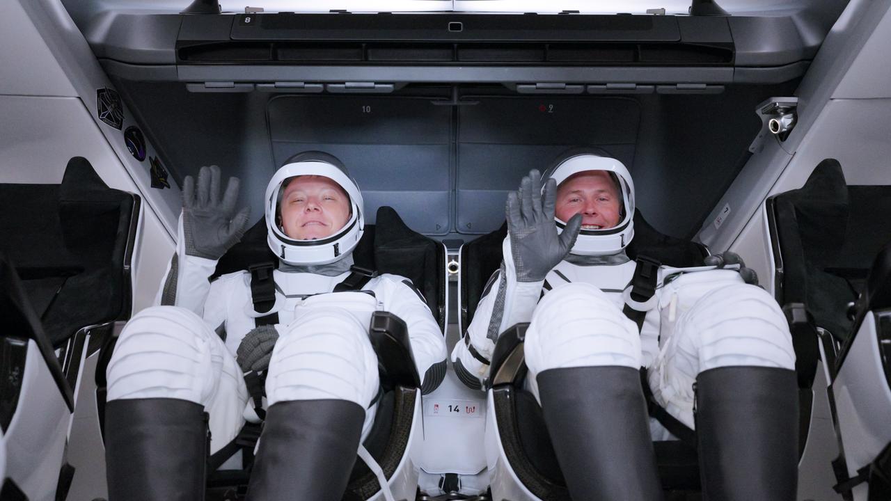 NASA’s SpaceX Crew-9 crew members Roscosmos cosmonaut Aleksandr Gorbunov (left) and NASA astronaut Nick Hague smile and wave inside a Dragon spacecraft at Space Launch Complex-40 at Cape Canaveral Space Force Station in Florida ahead of liftoff on Saturday; Sept. 28; 2024. Hague and Gorbunov will launch to the International Space Station aboard SpaceX’s Dragon spacecraft and Falcon 9 rocket. Launch is targeted for 1:17 p.m. EDT for the ninth crew rotation mission with SpaceX to the space station as part of the agency’s Commercial Crew Program.