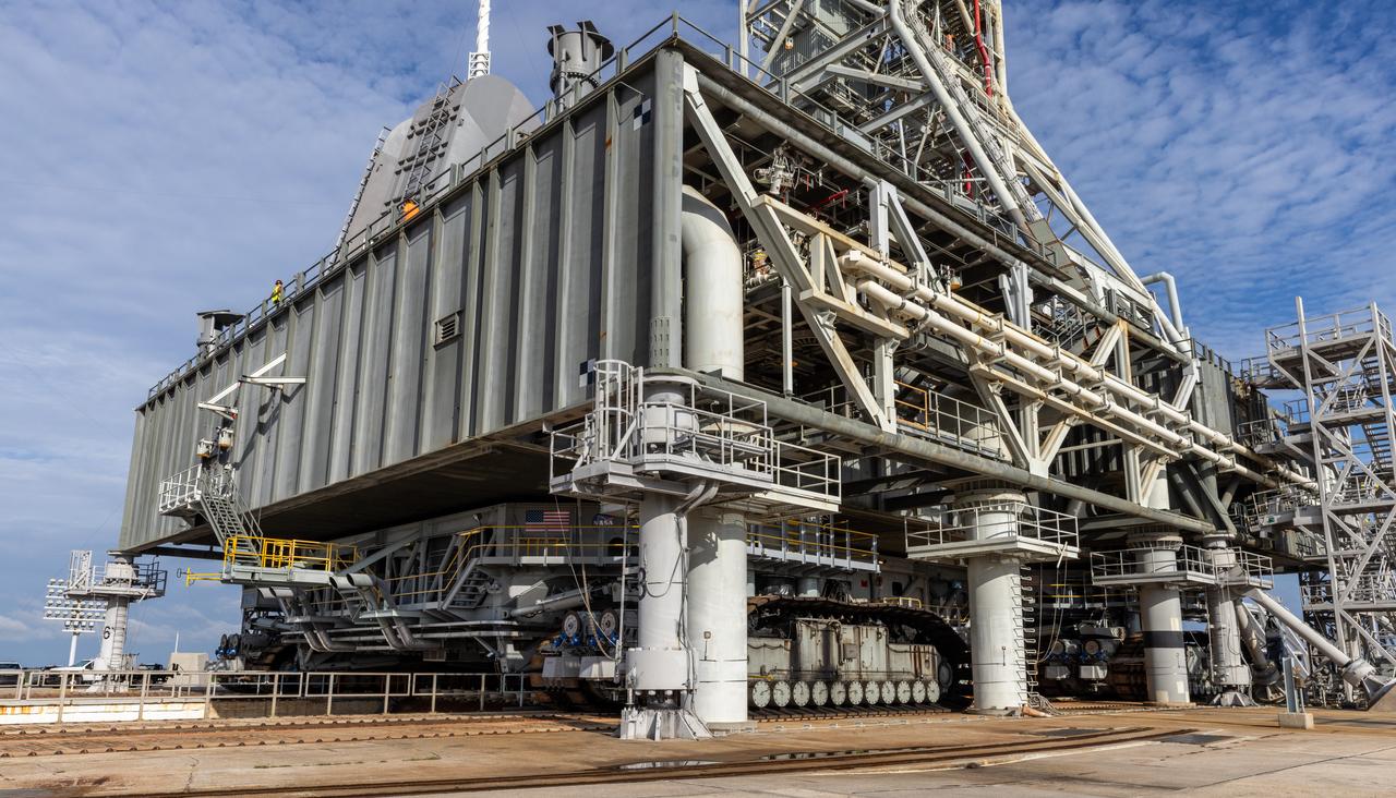 Teams with NASA’s Exploration Ground Systems Program at the agency’s Kennedy Space Center in Florida prepare to move mobile launcher 1 atop the agency’s crawler-transporter 2 from Launch Complex 39B to the Vehicle Assembly Building on Tuesday, Oct. 1, 2024. The crawler recently reached 2,500 miles traveling to the launch pad since its construction in 1965. The mobile launcher has been at the launch pad since August 2023 undergoing upgrades and tests in preparation for NASA’s Artemis II mission. The mobile launcher will be used to assemble, process, and launch NASA’s SLS (Space Launch System) and Orion spacecraft to the Moon and beyond. 