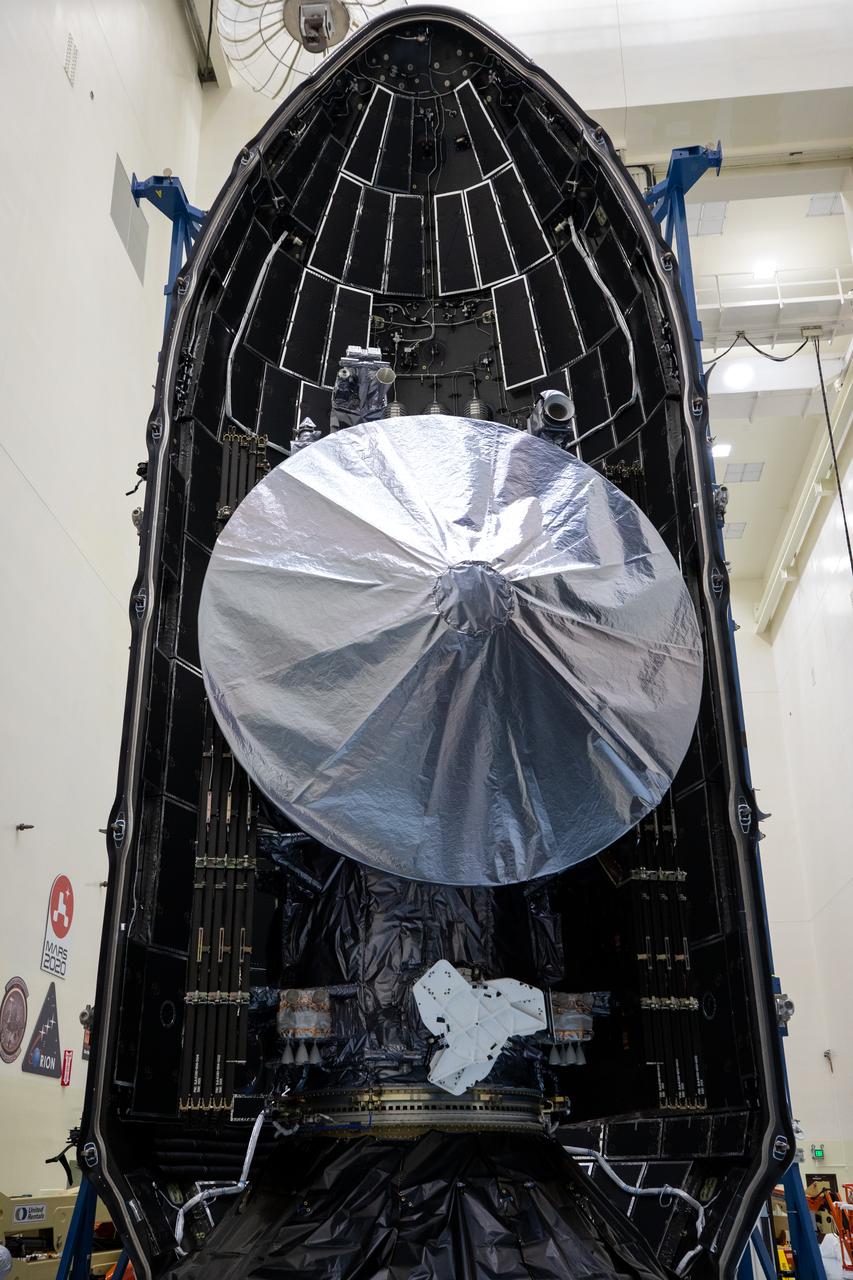 Technicians encapsulated NASA’s Europa Clipper spacecraft inside payload fairings on Wednesday, Oct. 2, 2024, in the Payload Hazardous Servicing Facility at NASA’s Kennedy Space Center in Florida. The fairings will protect the spacecraft during launch as it begins its journey to explore Jupiter’s icy moon, Europa. The mission will help scientists determine if the moon could support life. NASA and SpaceX are targeting launch at 12:31 p.m. EDT on Thursday, Oct. 10, 2024, from Launch Complex 39A at Kennedy Space Center in Florida.