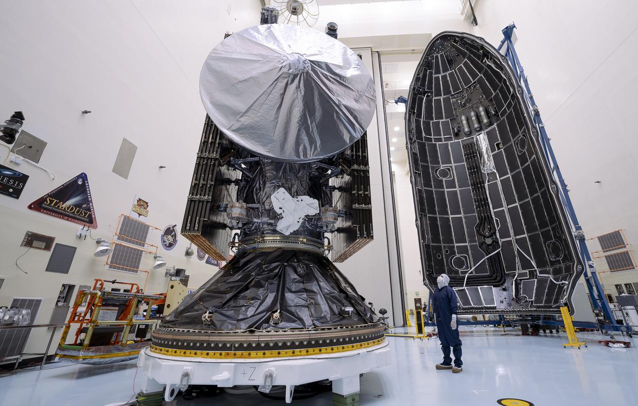 Technicians prepare to encapsulate NASA’s Europa Clipper spacecraft inside SpaceX’s Falcon Heavy payload fairing in the Payload Hazardous Servicing Facility at NASA’s Kennedy Space Center in Florida on Wednesday, Oct. 2, 2024. The payload fairing will protect the spacecraft during liftoff from Launch Complex 39A on its journey to explore Jupiter’s icy moon, Europa. The spacecraft will complete nearly 50 flybys of Jupiter’s icy moon, Europa, to determine if there are conditions suitable for life beyond Earth.